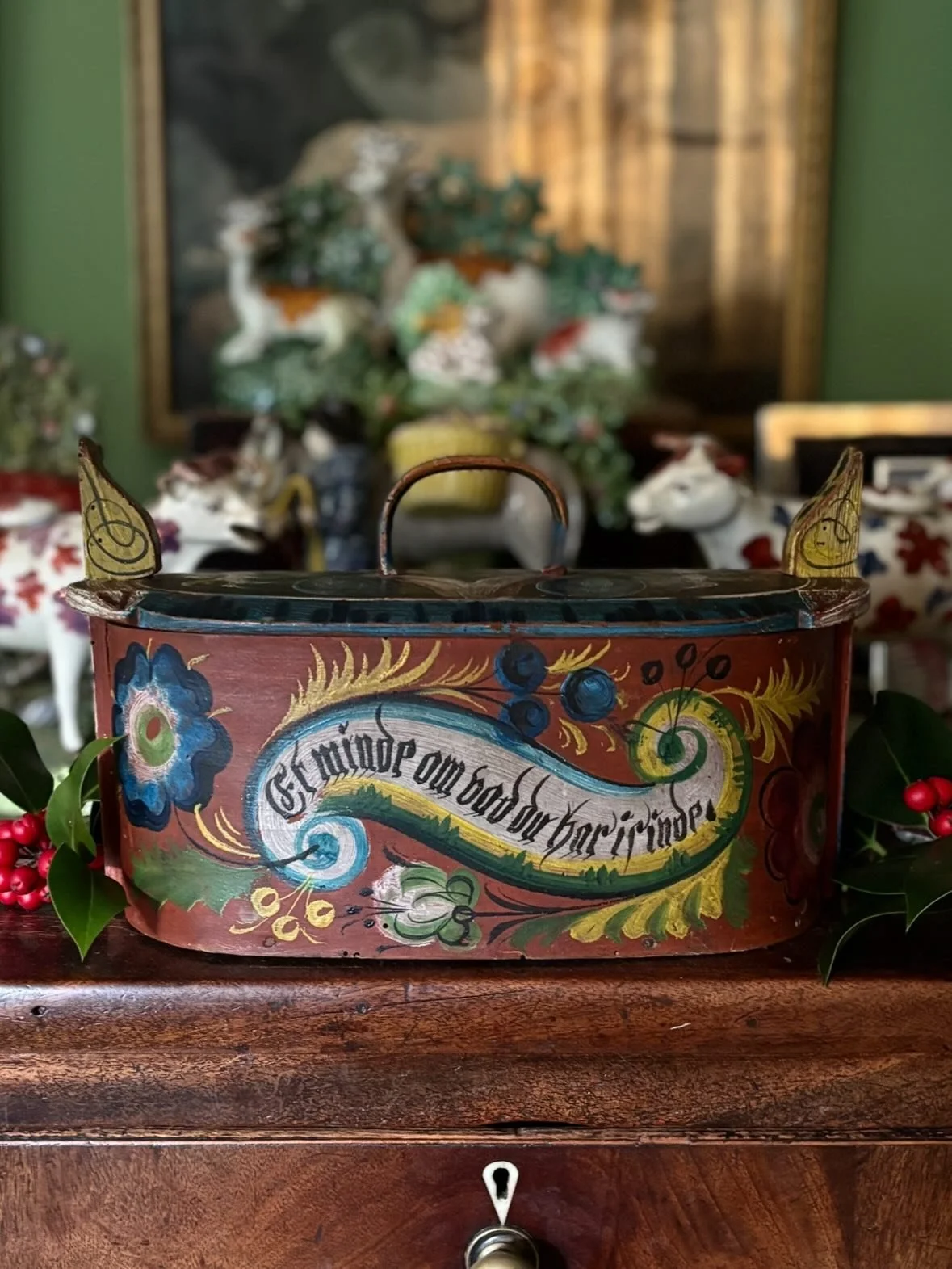 FOR SALE An antique Scandinavian folk art bentwood box with fabulous hand painted Rosemaling decoration, circa late 19th century.

These beautiful boxes are also known as tine boxes because of the distinctive tines at each end that hold the lid on. T