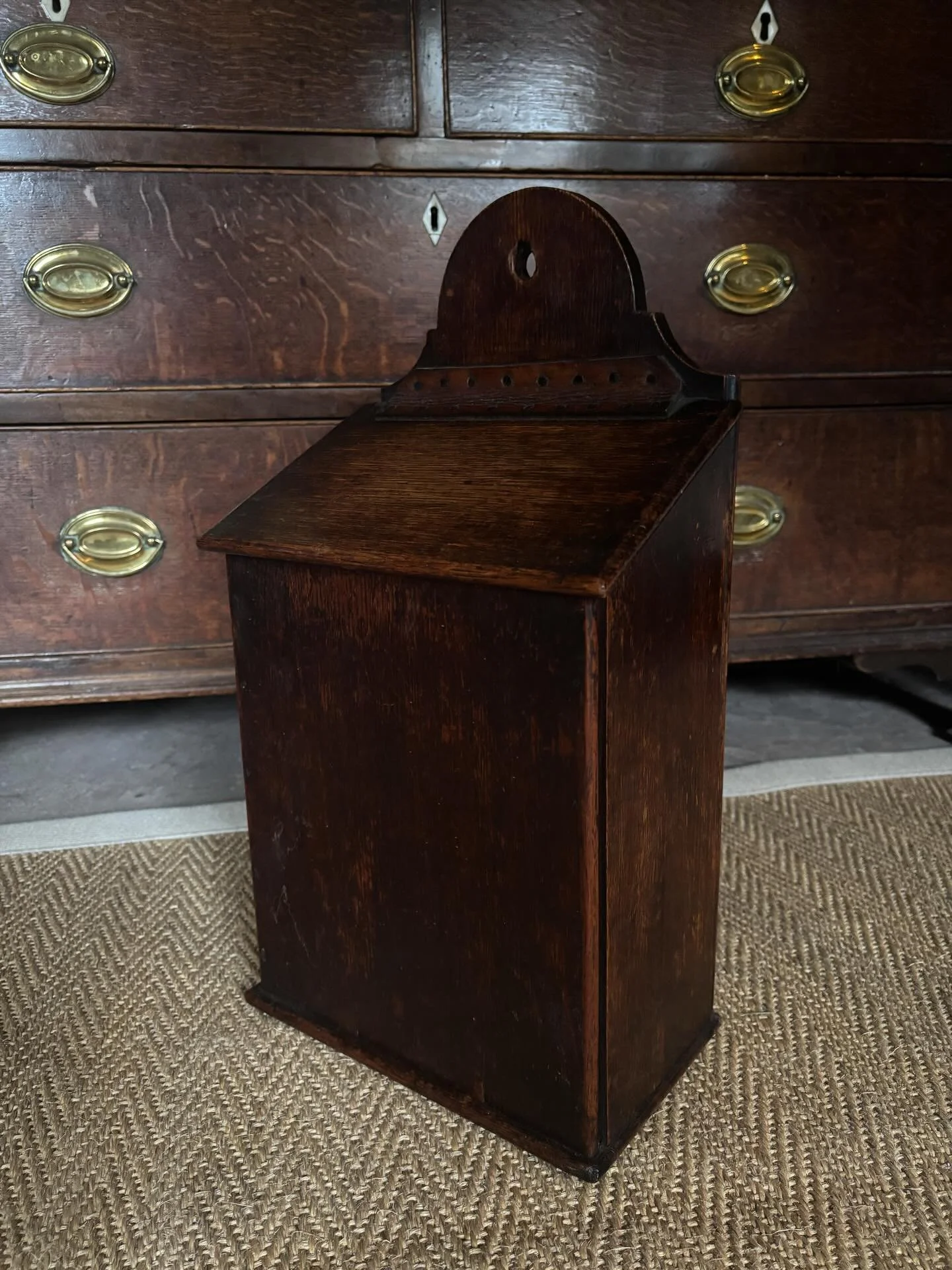 FOR SALE A magnificent and unusually large antique oak candle box with immaculate nailed leather hinge, early 19th century. 

Boxes like this were common household items in the late 18th and early 19th centuries for storing household necessities such