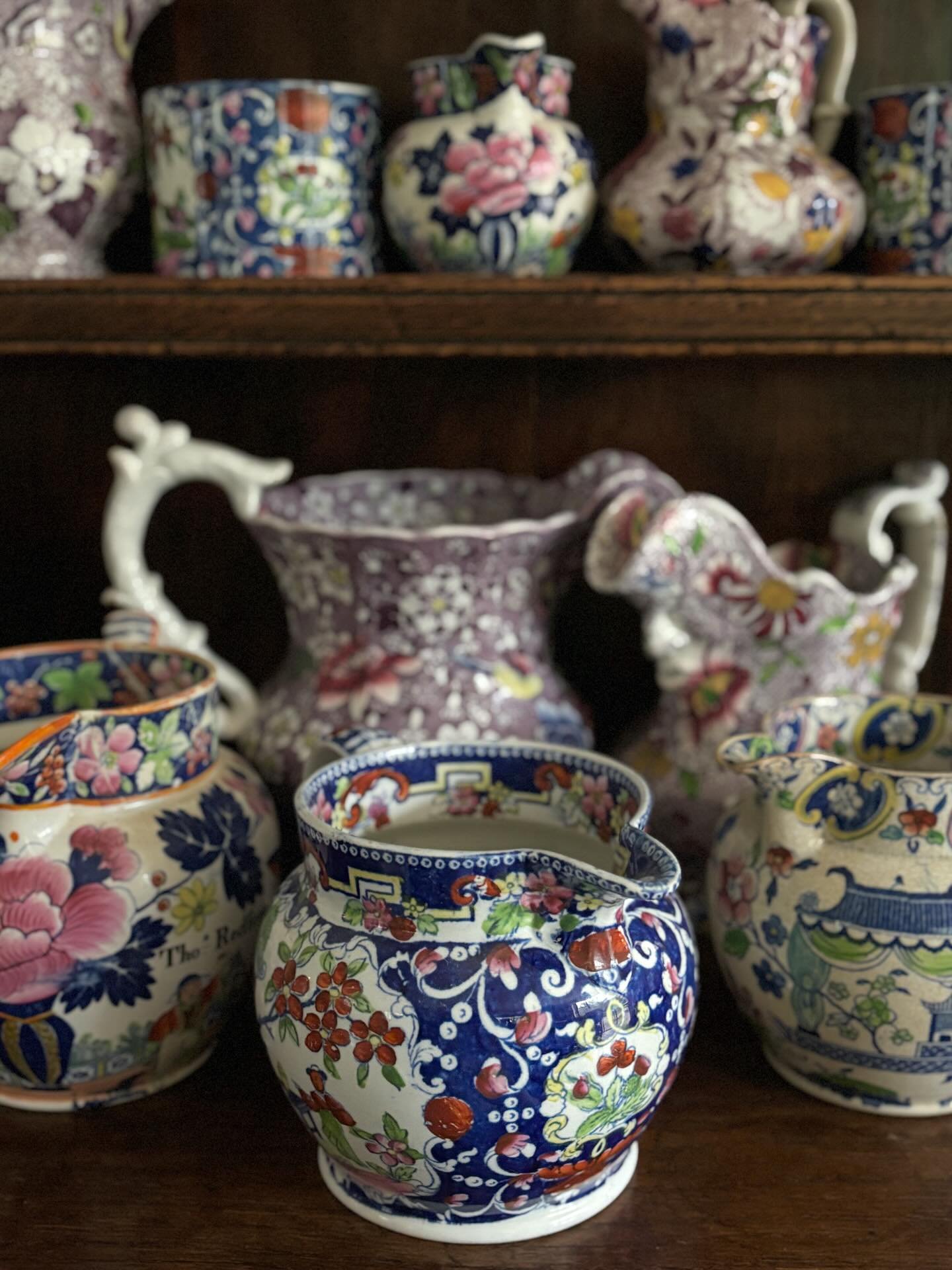 FOR SALE A superb Georgian filled-in transferware jug by Baggerley &amp; Ball in the &lsquo;Boy in the Door&rsquo; pattern, circa 1825. 

This very pretty jug features hand colouring in sage green, pink, rust red and yellow. A beautiful, intricate pa