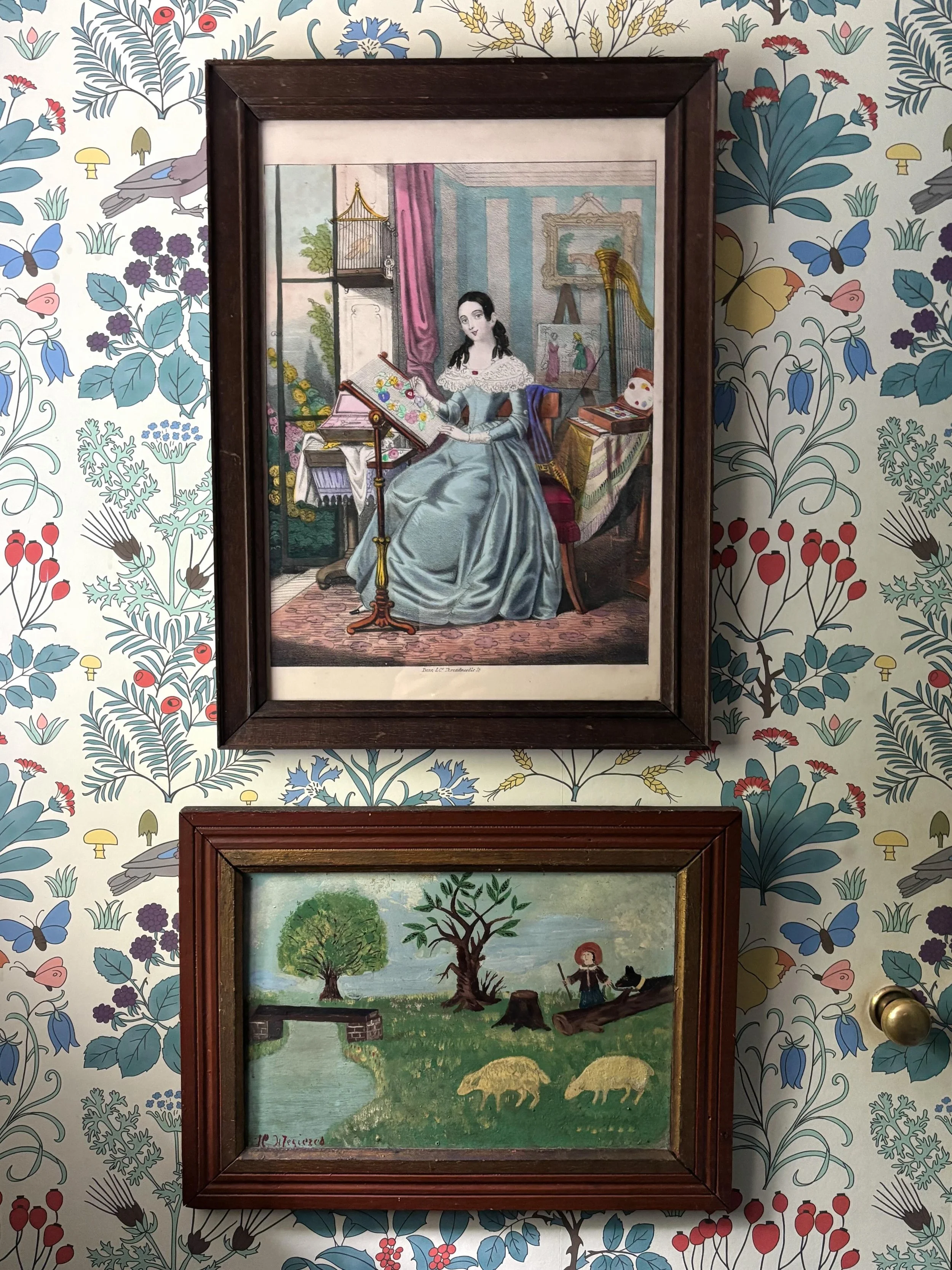 One of my favourite paintings is this naive little folk art oil painting that hangs on the jib door in our downstairs loo. Painted by a child or a very amateur hand, it is all the more charming for its obvious shortcomings. And above it a print of a 