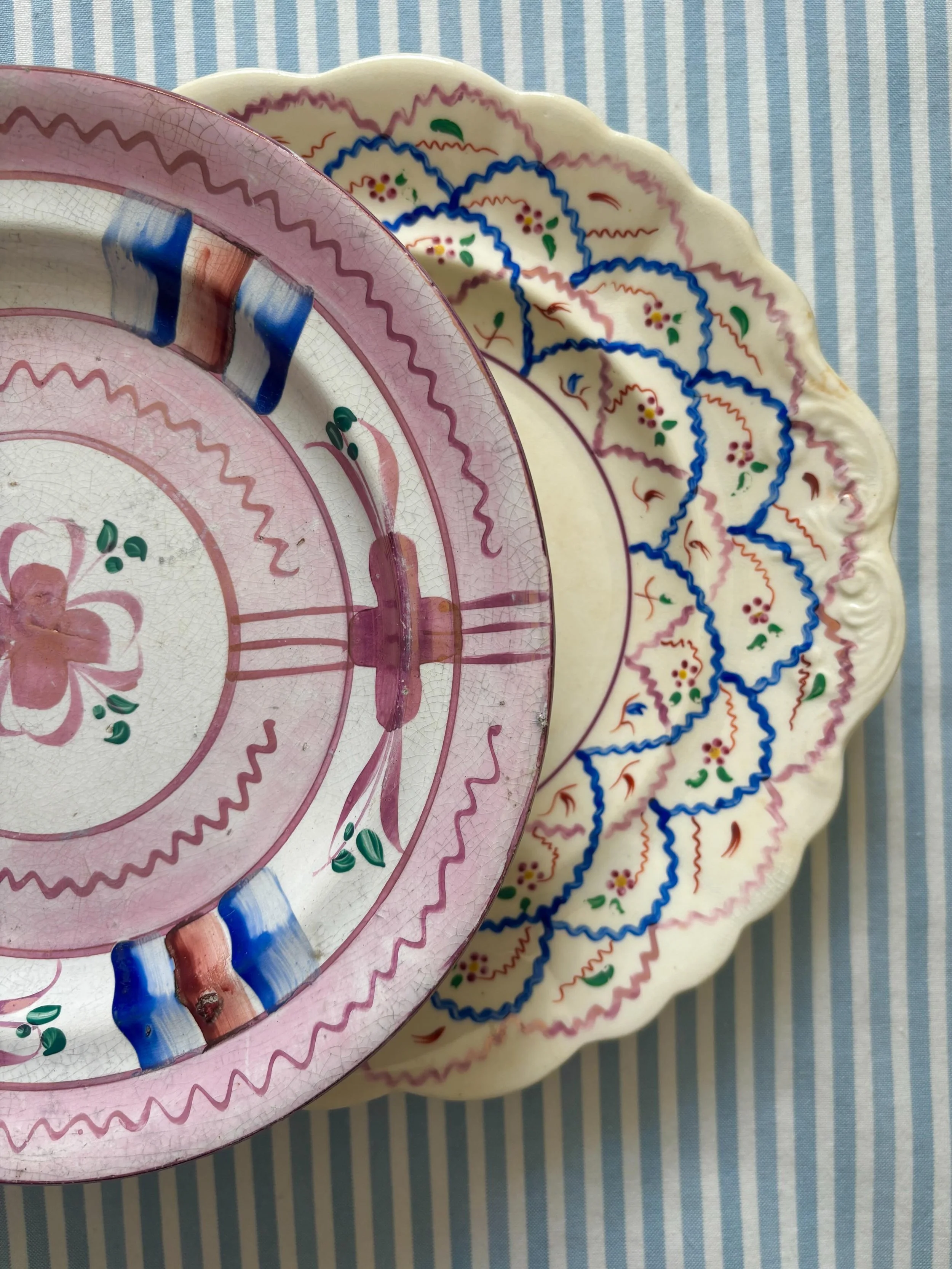FOR SALE Two striking pieces of pink lustre pottery.

1.) A vibrant and scarce antique English pink lustre earthenware plate early to mid 19th century. The pink lustre is so wonderfully bright, almost mirror-like, and the zig zag border and recurring