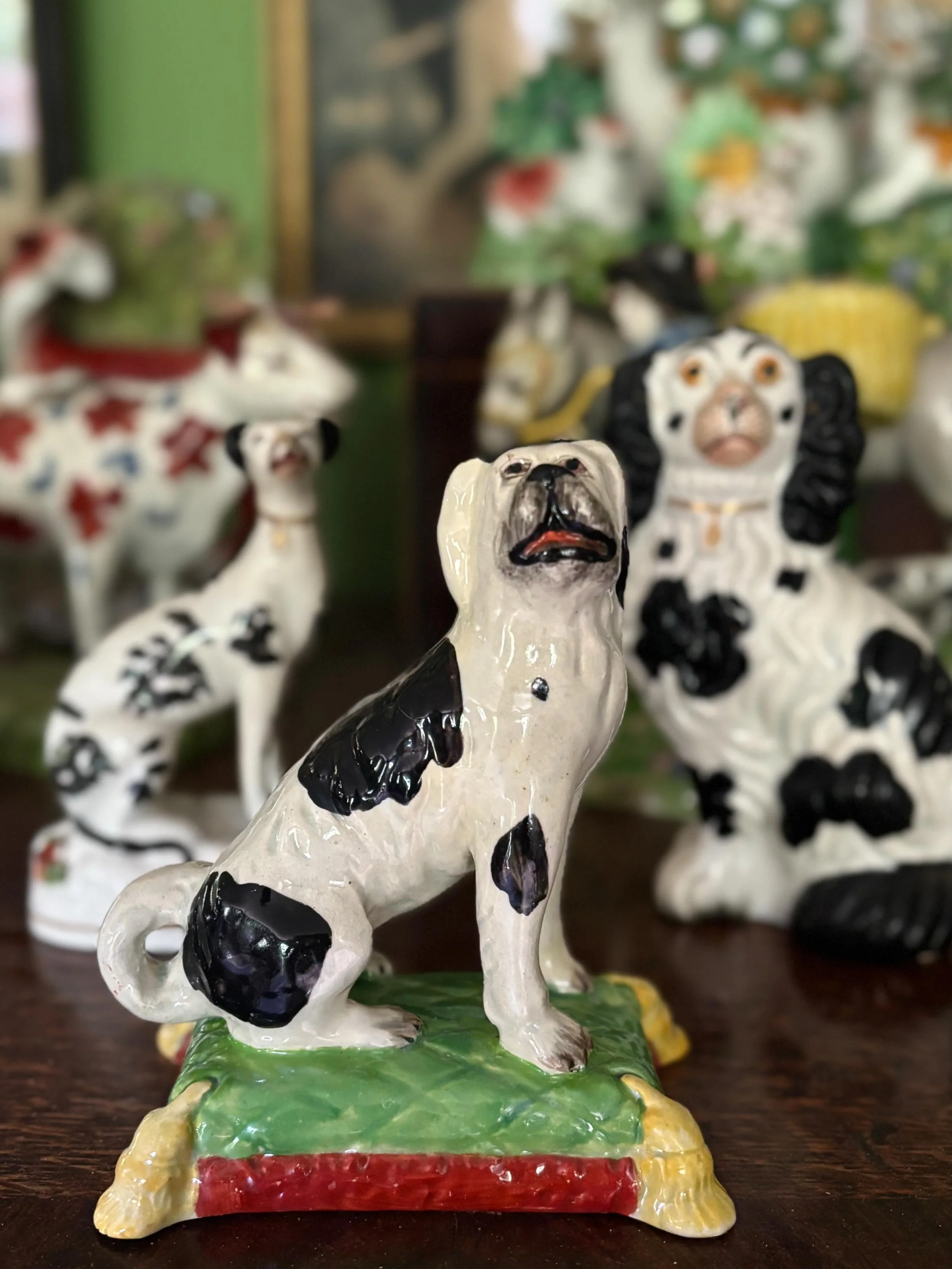 I started a collection of miniature Staffordshire figures a while ago and whilst I have a variety of animals in my collection, I have ended up with a disproportionate number of black and white dogs of various forms. This latest addition isn&rsquo;t a