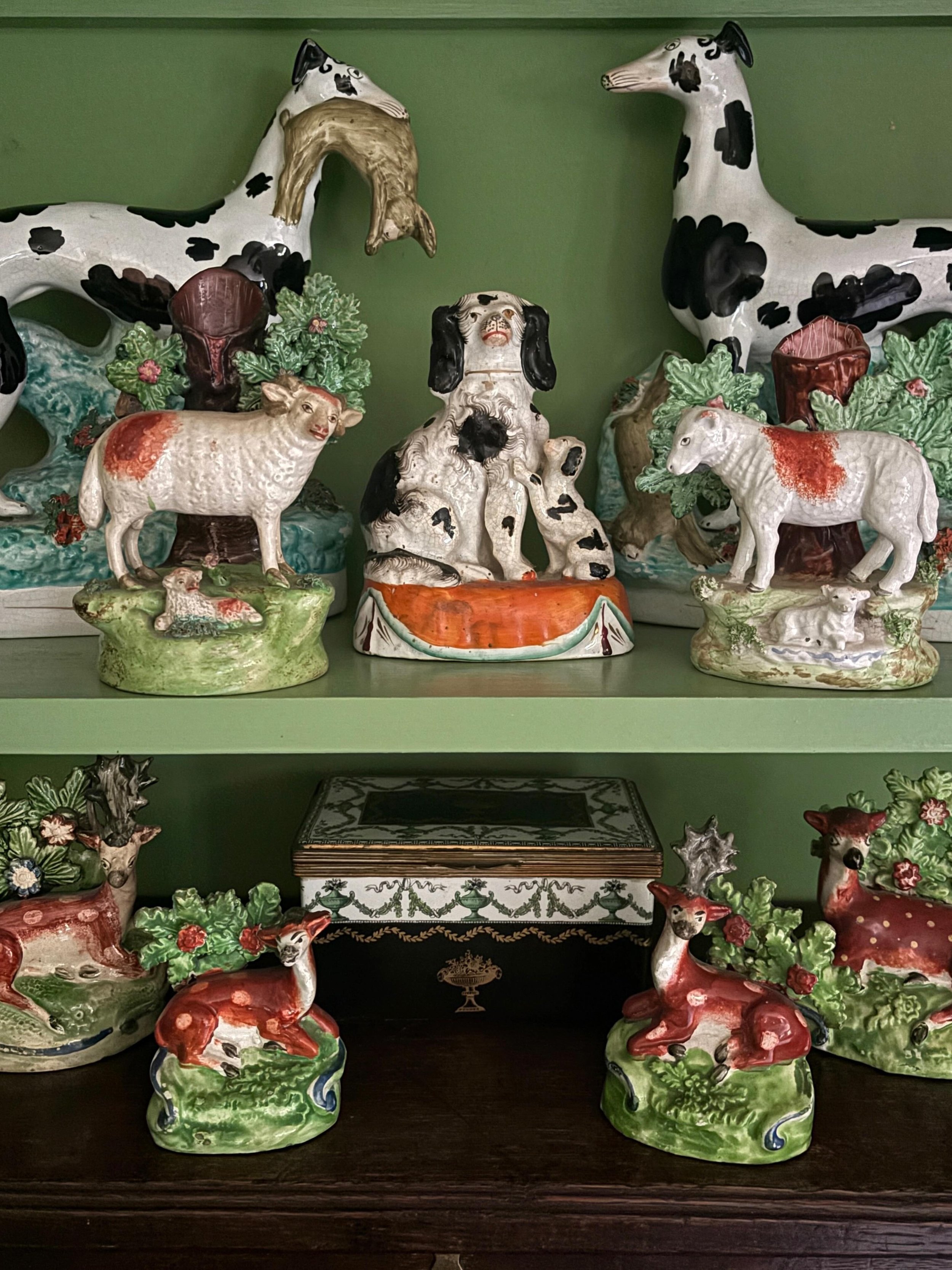 Some of my favourite Staffordshire bocage figures along with two very splendid mid 19th century Disraeli greyhounds. 🧡💚

#antiquestaffordshirepottery #staffordshirebocagefigure #staffordshiregreyhounds