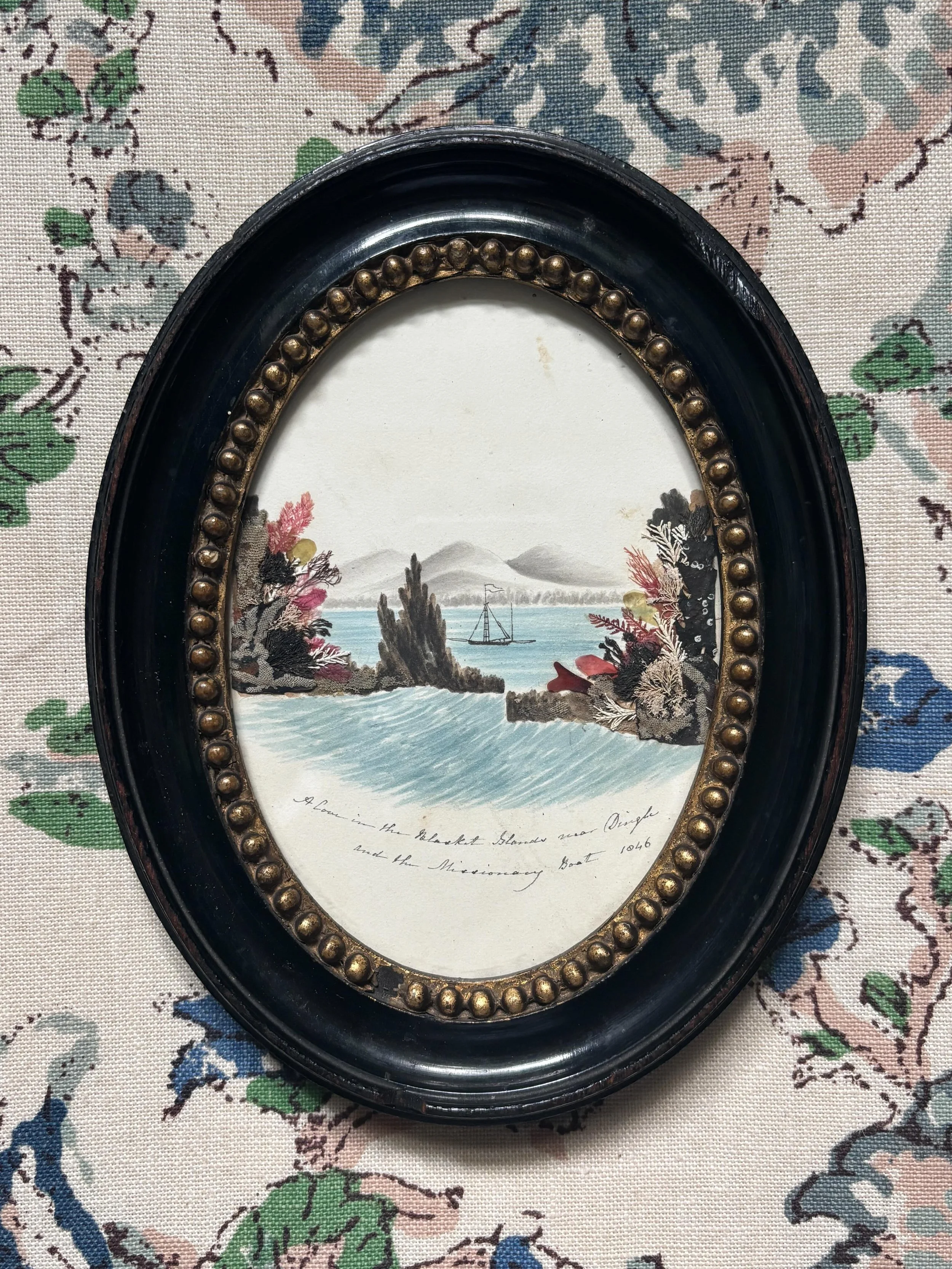 FOR SALE A beautiful little mid 19th century watercolour painting decorated with natural seaweed. Beneath the painting is the inscription, &lsquo;A Cove in the Blacket Islands near Dingle and the Missionary Boat 1846&rsquo;.

It has been so exquisite