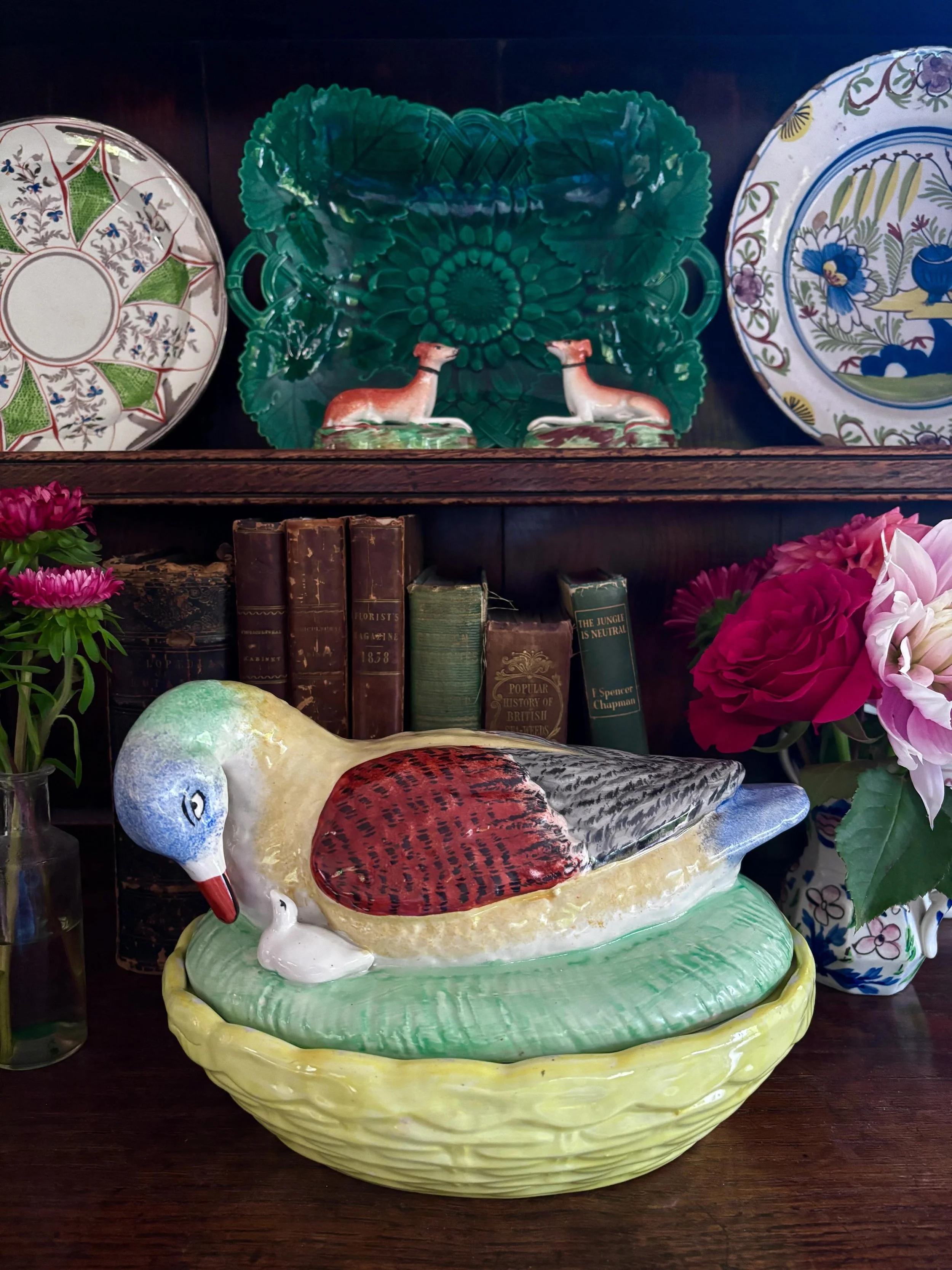 FOR SALE I think I&rsquo;ve been waiting about three years to find one of these! And what a beautiful example it is: a Staffordshire pottery duck with a little duckling tucked in beside it, on a yellow basketweave base. 

I always make a beeline for 