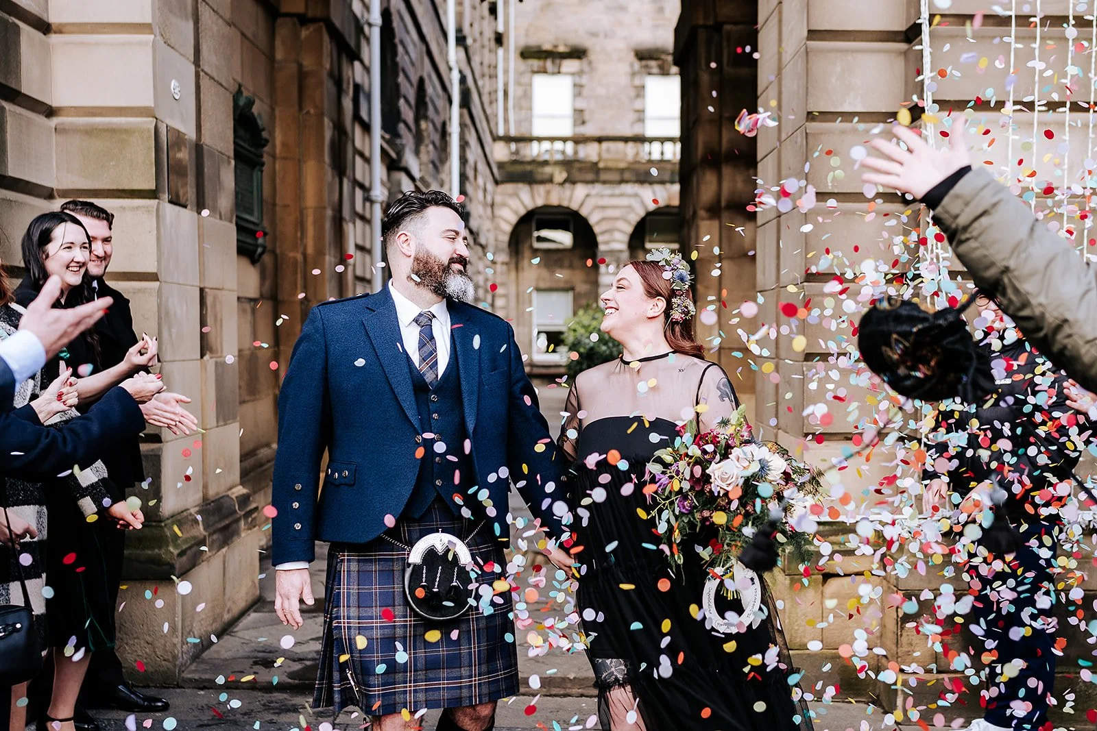 Confetti on the royal mile - Edinburgh City Chambers wedding by Lou Rob Photo