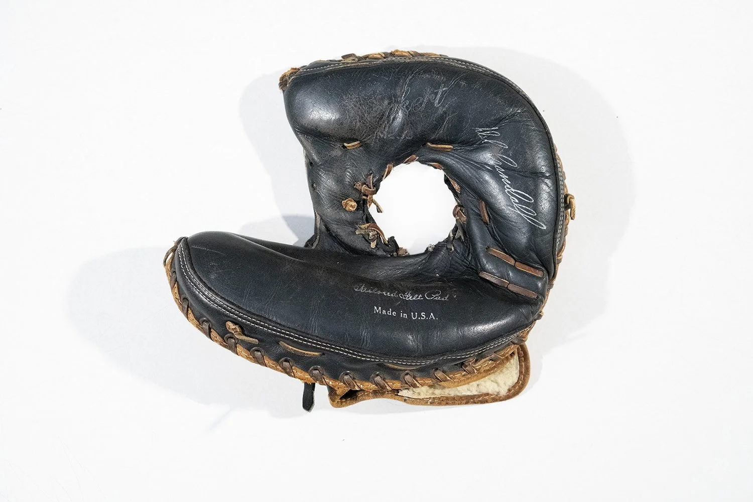 Aaron Cowan, "Zugzwang", modified thrifted catcher's mitt, 2023
