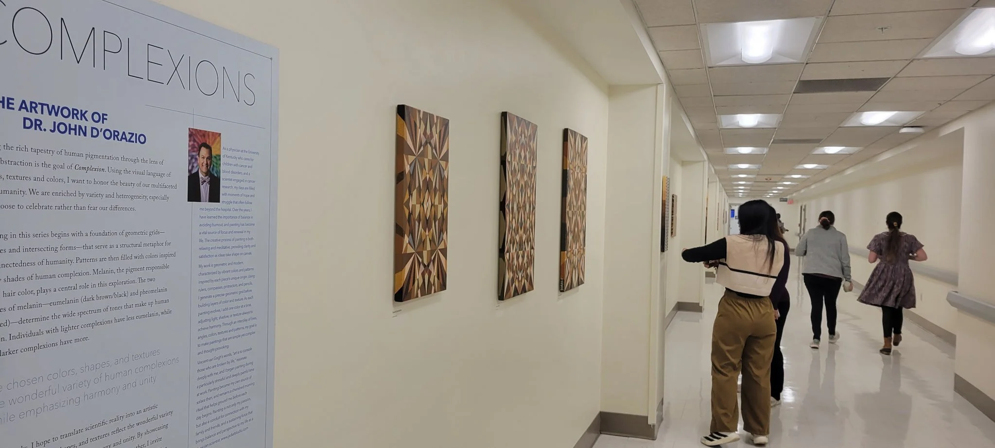 People looking at the Complexions Exhibit, Winter 2025-26