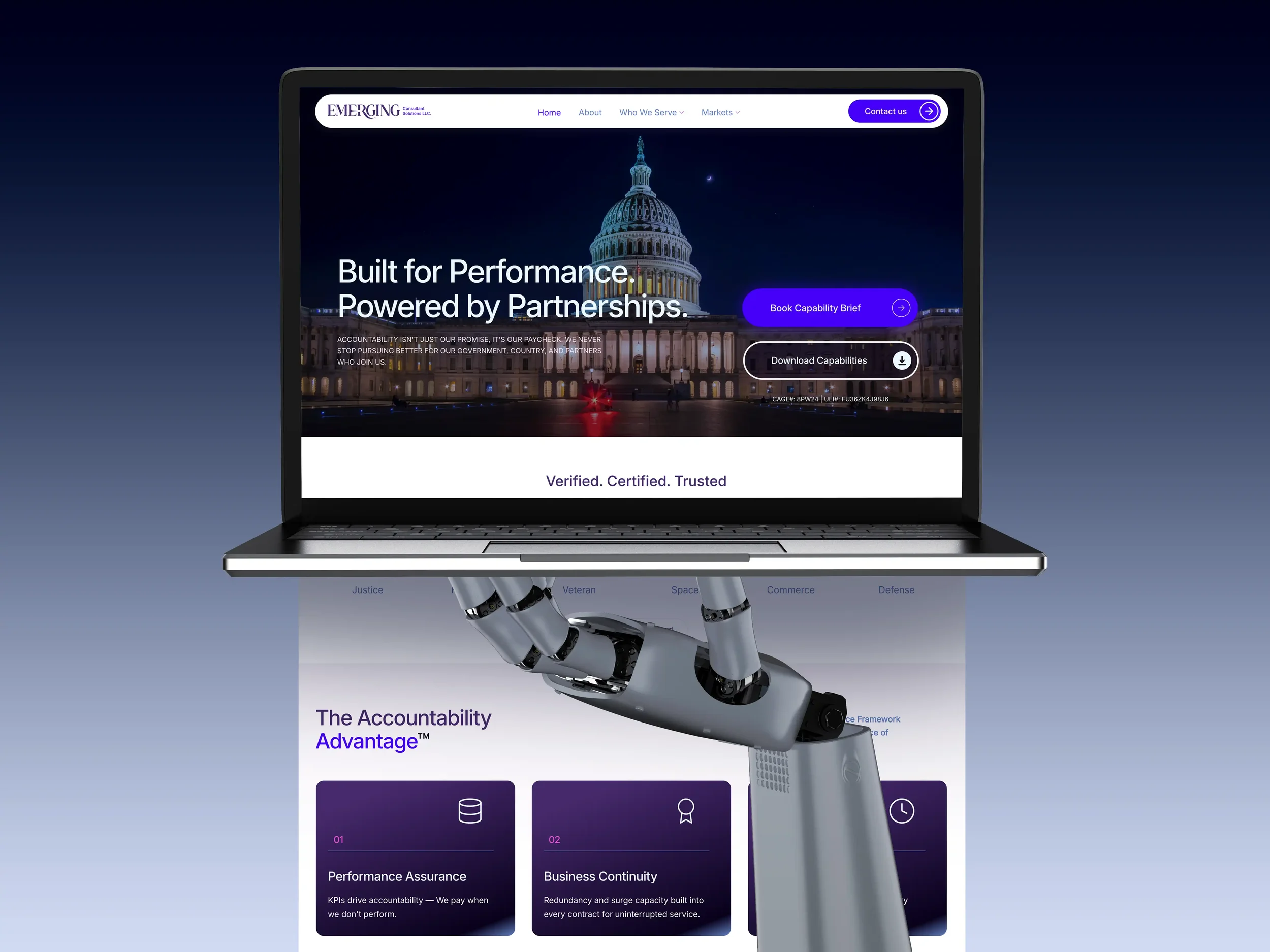 A robotic arm holding a laptop displaying a website with a night-time cityscape background and the U.S. Capitol building.