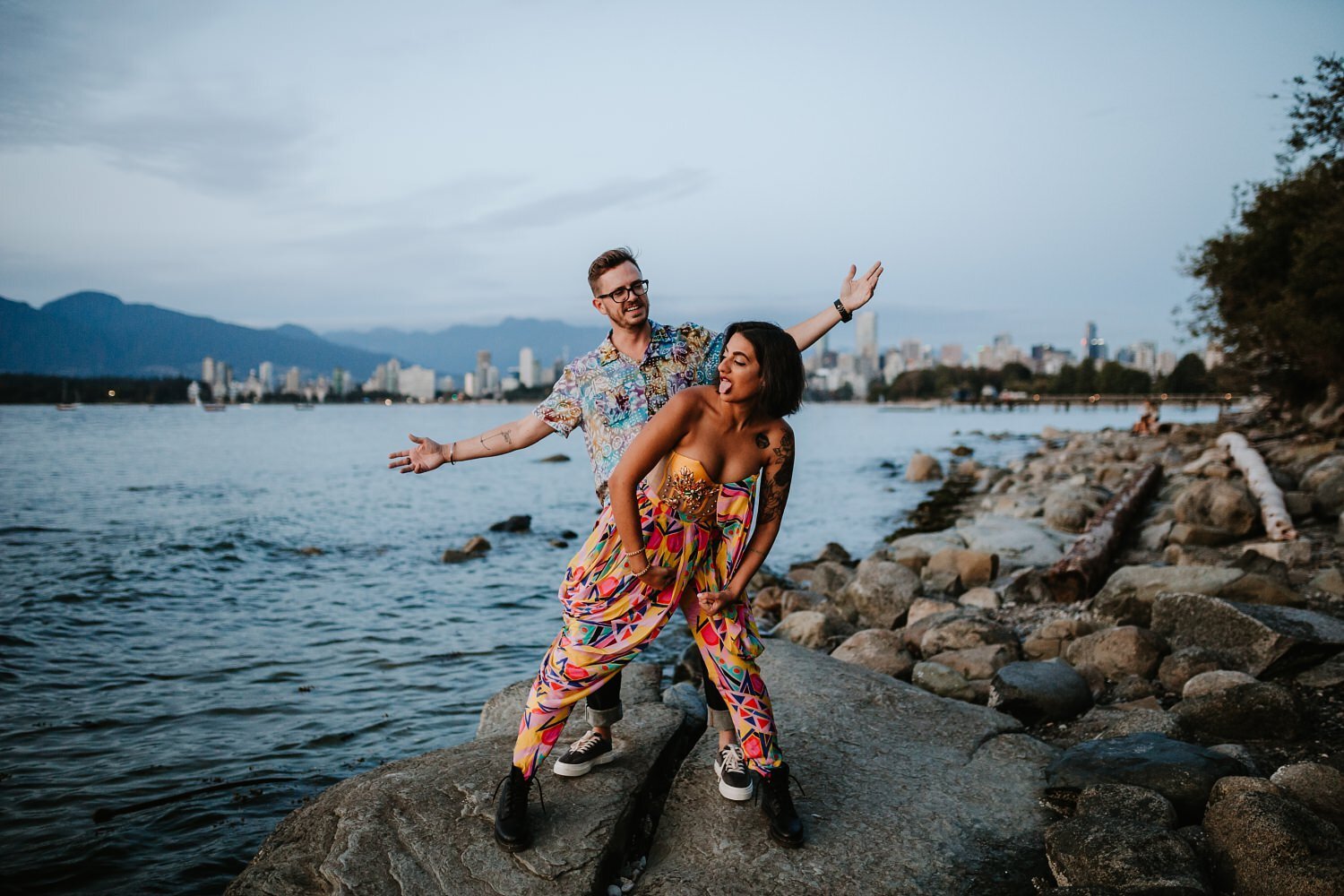 Bright and colorful outfit idea for a sunset beach engagement photoshoot.