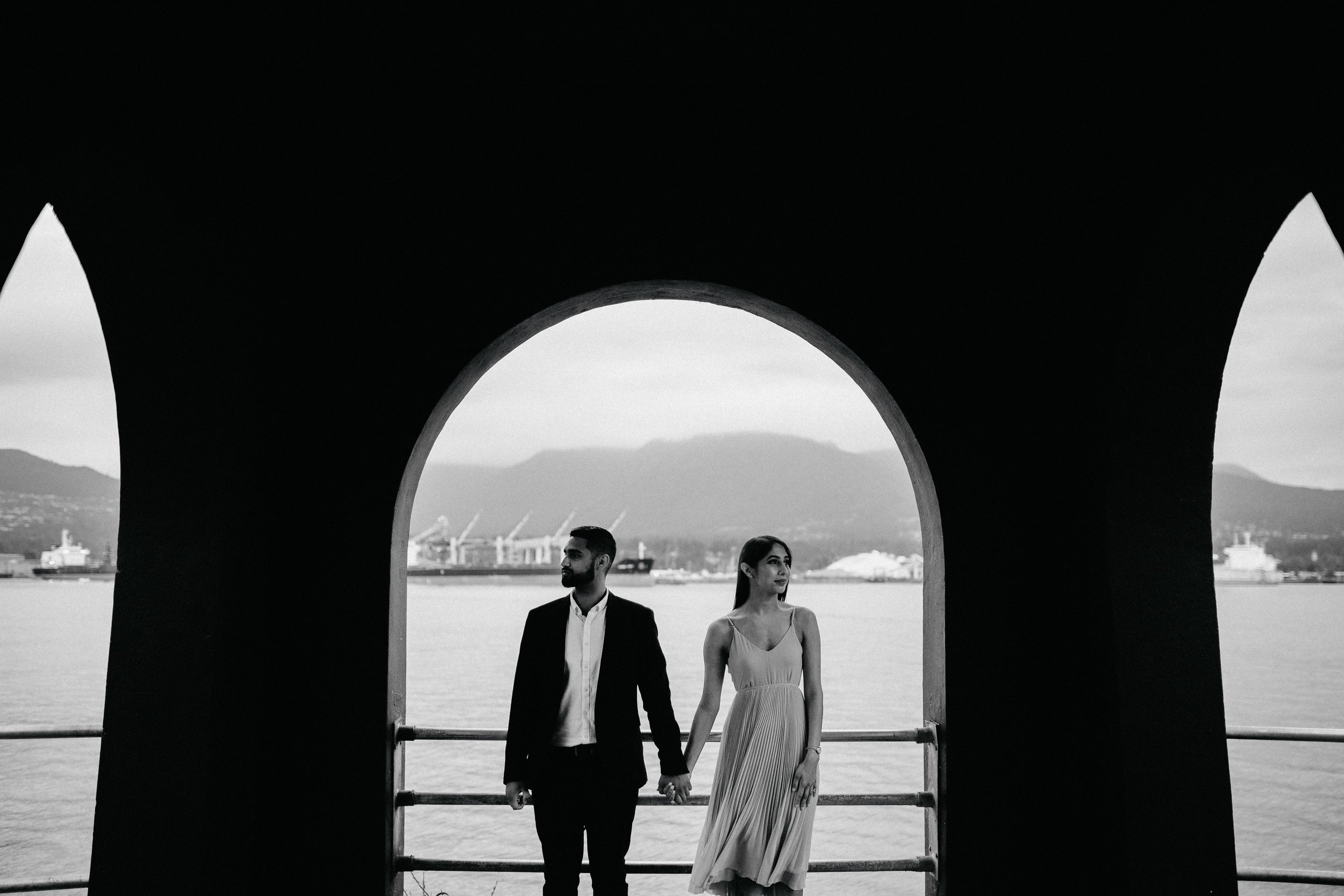 Engaged couple at Brockton Point Lighthouse in Stanley Park.