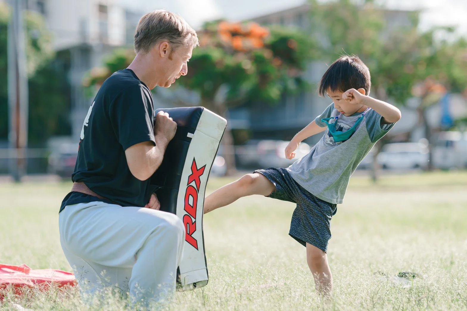 Practicing kicks in Aranami Dojo's Kyokushin Karate class.