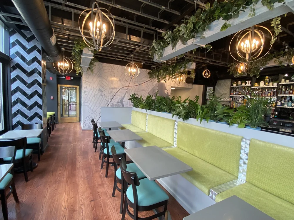 Haven dining room with green banquette seating