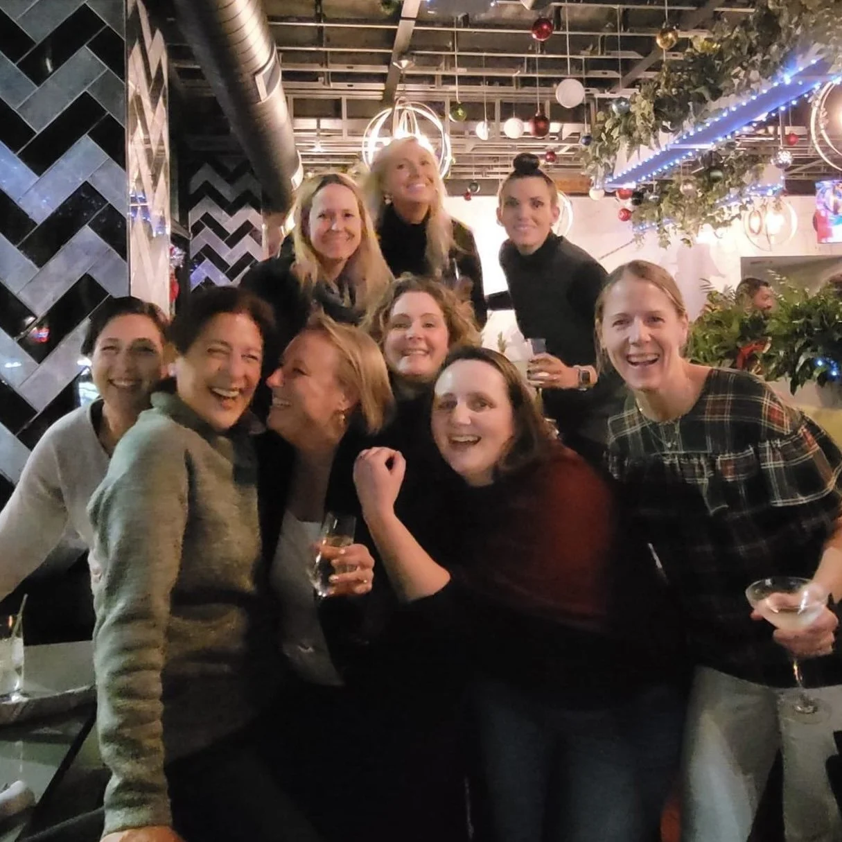 Friends celebrating together at Haven bar in Port Chester