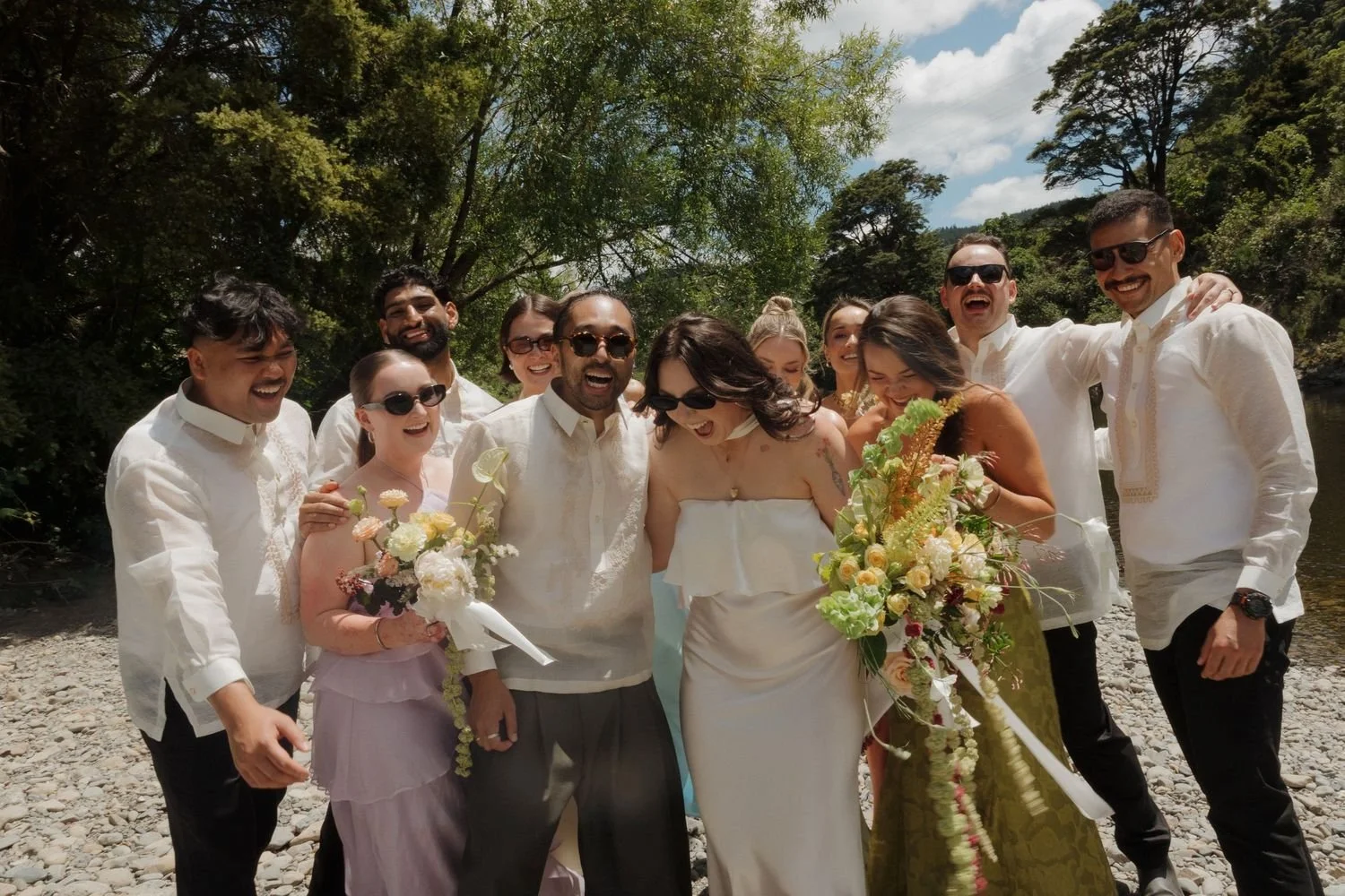 Beach wedding in New Zealand, Wellington with friends. Bride and groom. Beautiful soft glam natural makeup look. Destination weddings Makeup Artist