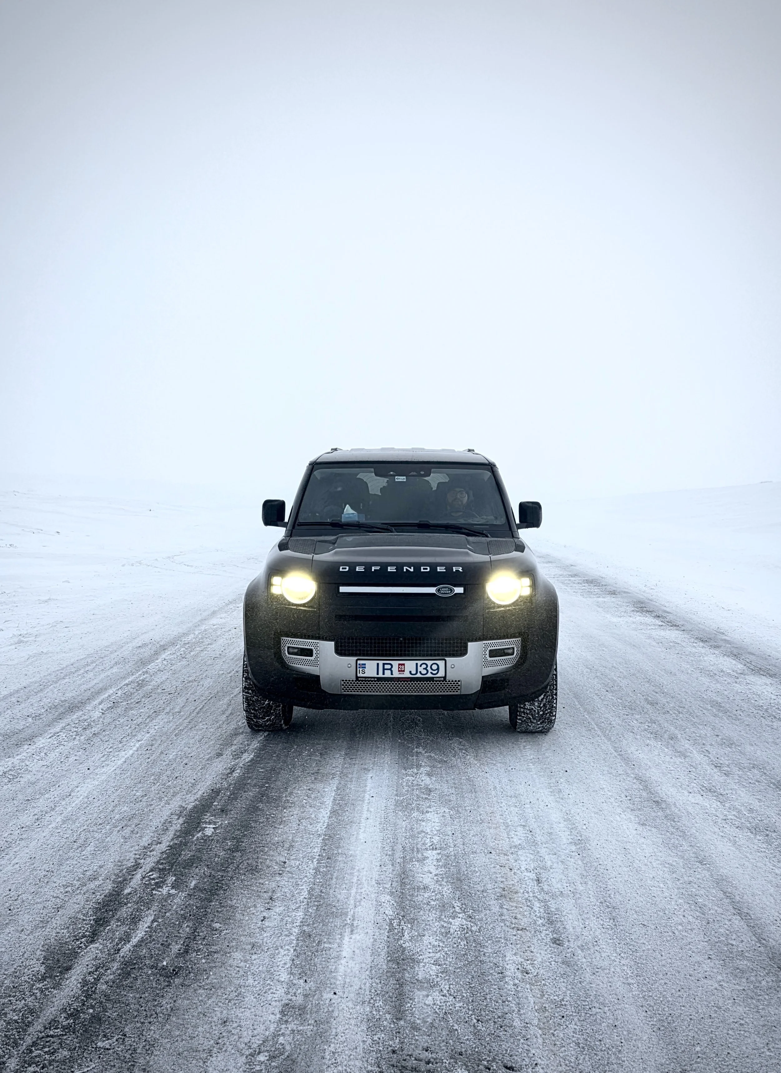 Land Rover Defender Driving In Winter Iceland
