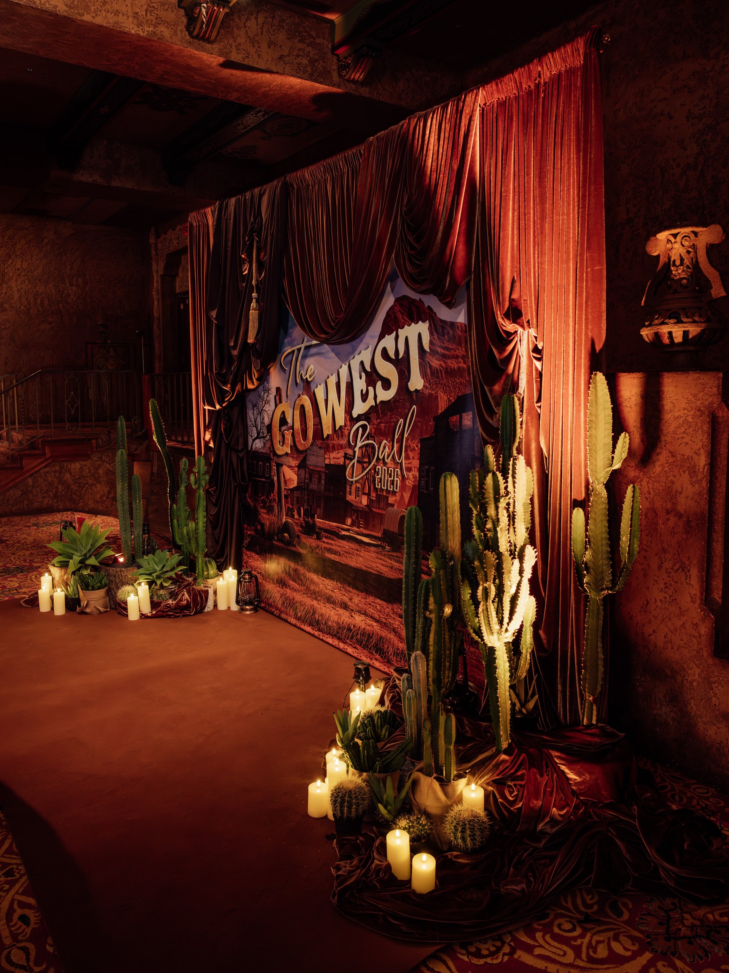 Western glamour, reimagined 🤎

Chocolate velvet draping, glowing lanterns, candlelight and cacti transformed this photo wall activation into a cinematic western moment guests couldn&rsquo;t stop photographing.

Moody. Luxurious. Immersive. Every det