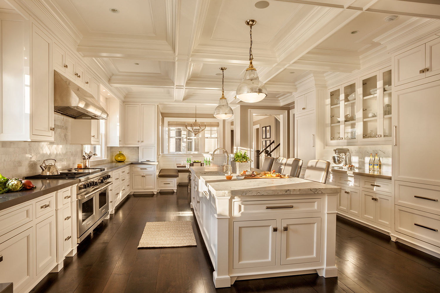 1950s New Canaan, CT ranch kitchen remodel, after: expanded luxury kitchen with banquette, by Studio Garrison.