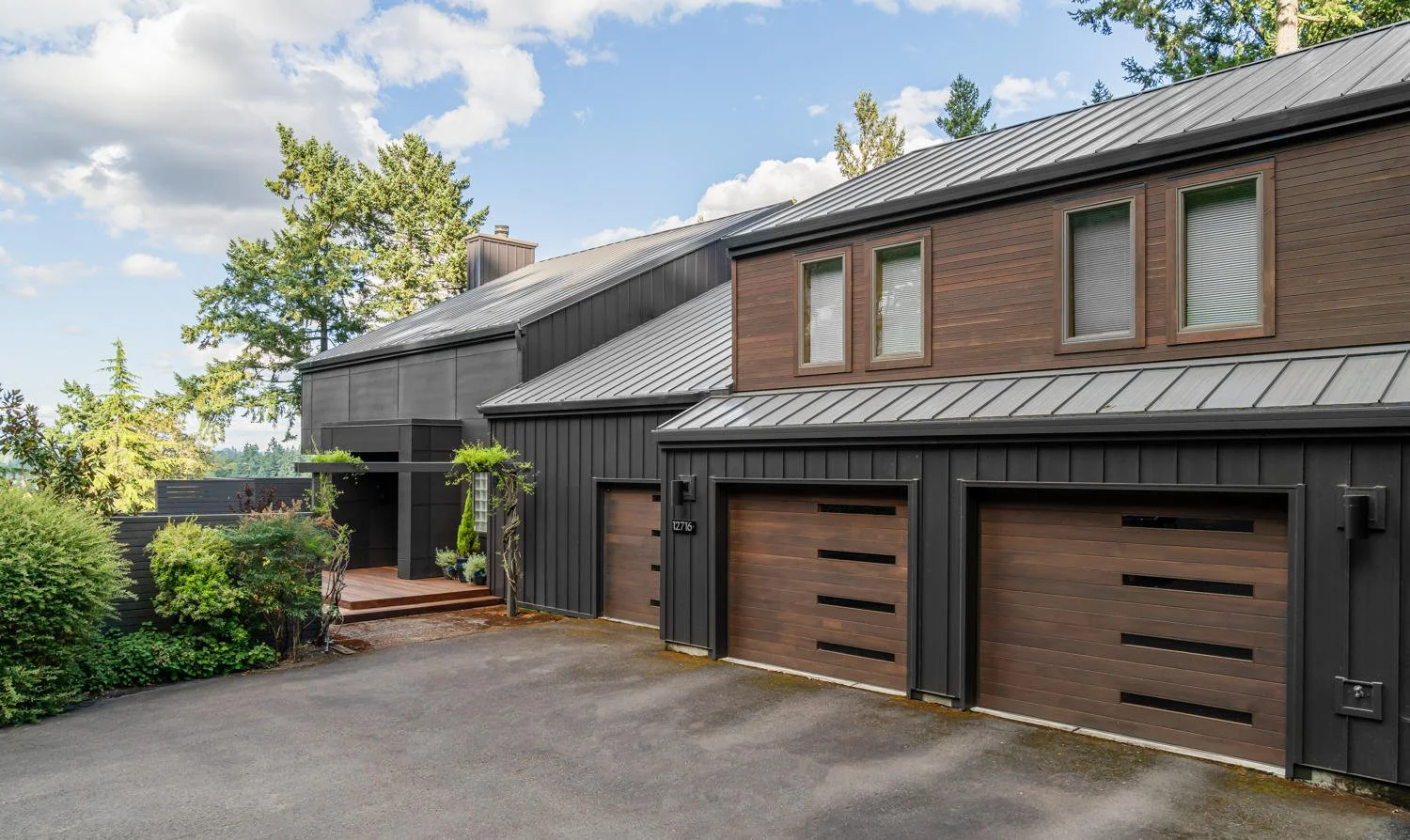 A home exterior with garages.