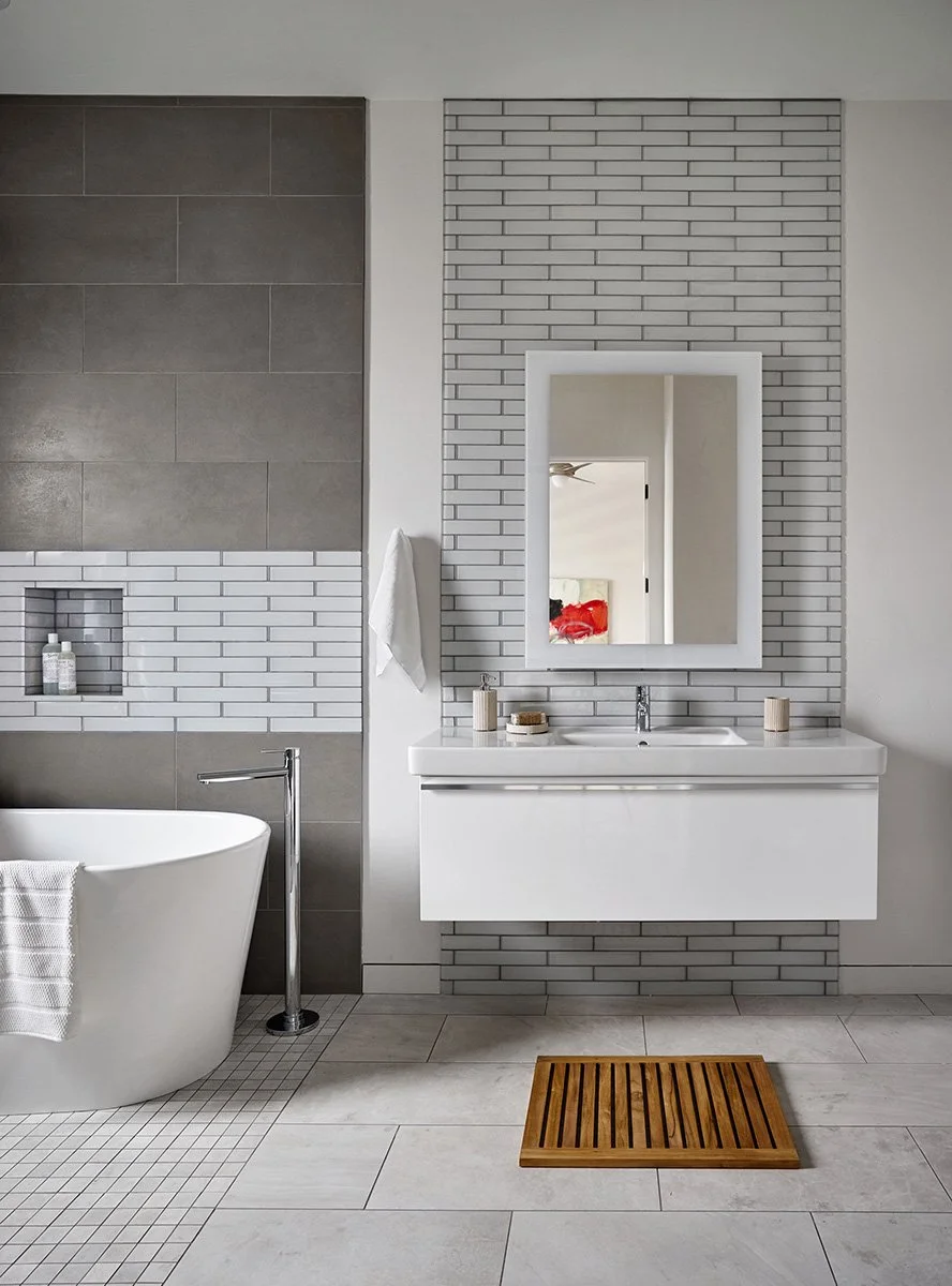 A bathroom with clean lines and curated fixtures.