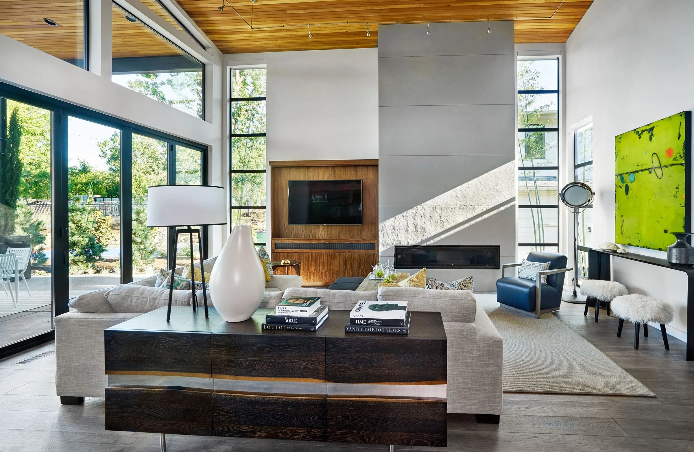 A living room featuring a large custom fireplace.