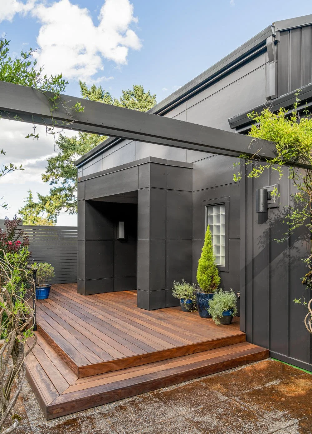 A home entrance with a stepped patio.