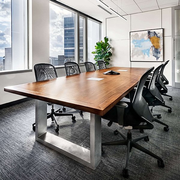 Conference room with large conference table and chairs.