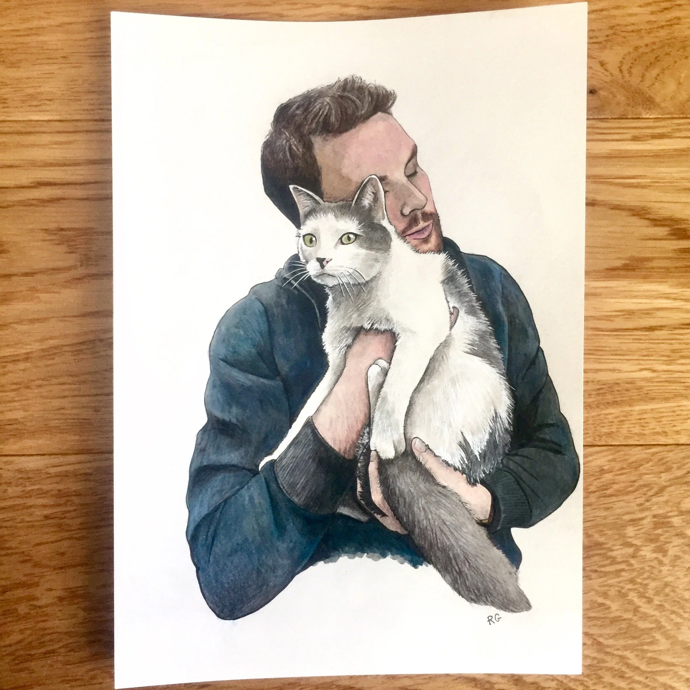 Artwork Man Hugging Cat.JPG