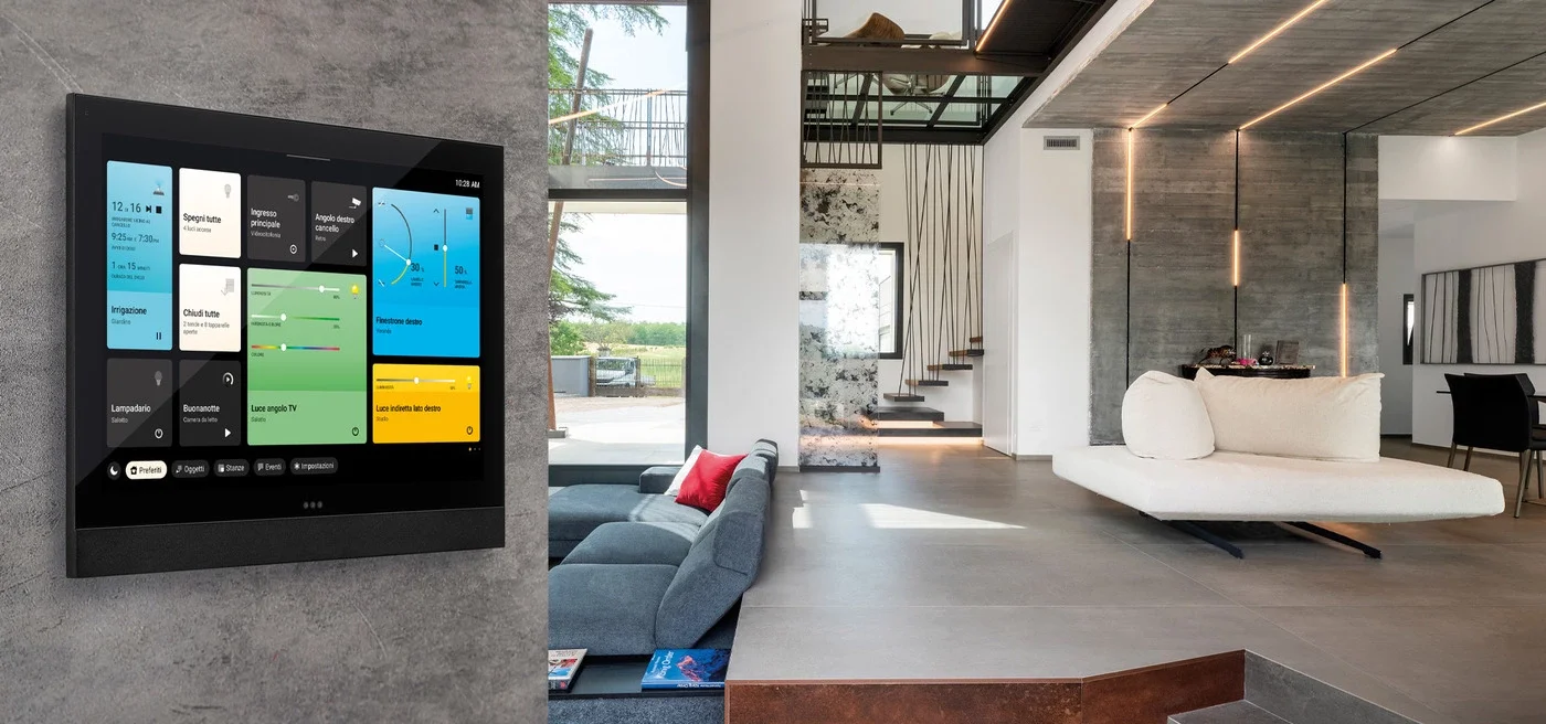 Modern home automation install with a wall-mounted digital control panel on a concrete wall, lighting controls and home automation.
Heating controls and AV Install