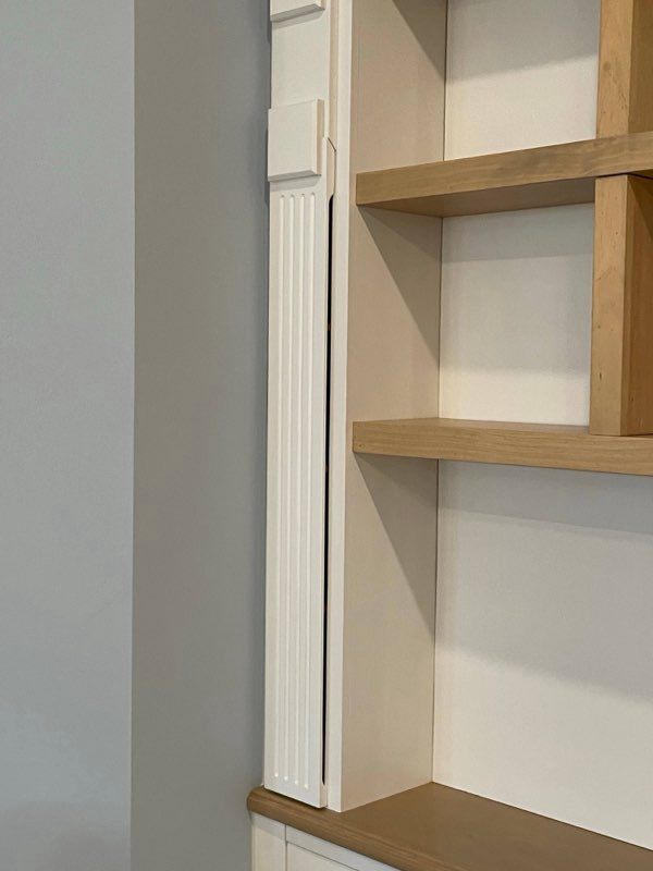 Columns pull out to reveal hanging stemglass and cocktail glass storage as shown in the following 2 pics... 