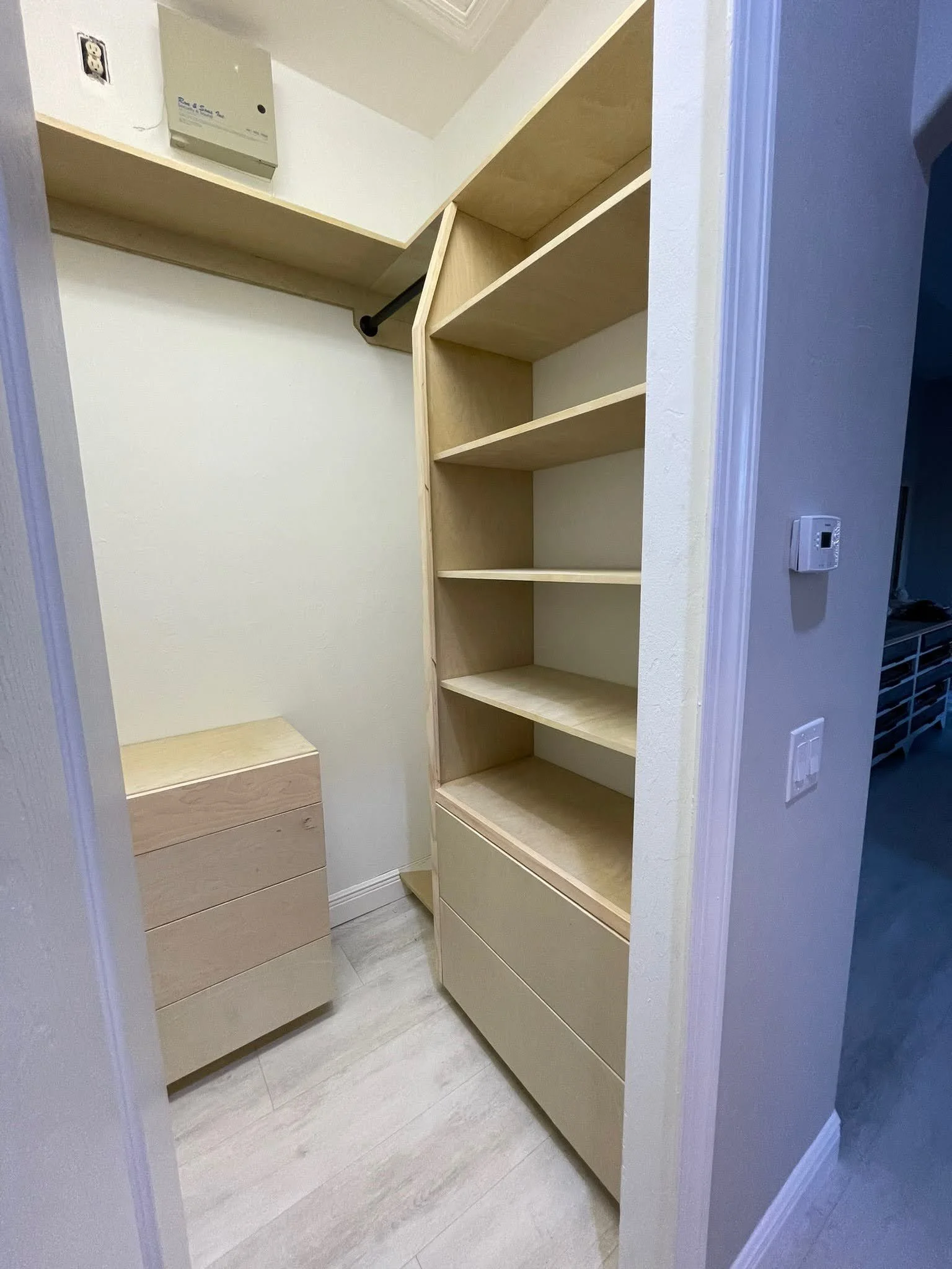 "His and Hers" Closets • Features include: 40" wide Dresser, Plenty of Adjustable Shelves, Inset Flat Panel Drawers, Tilted Shoe Shelves and Hanging Rods