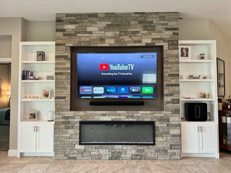 Modern twin Bookcase units flank this beautiful media focal wall. 
