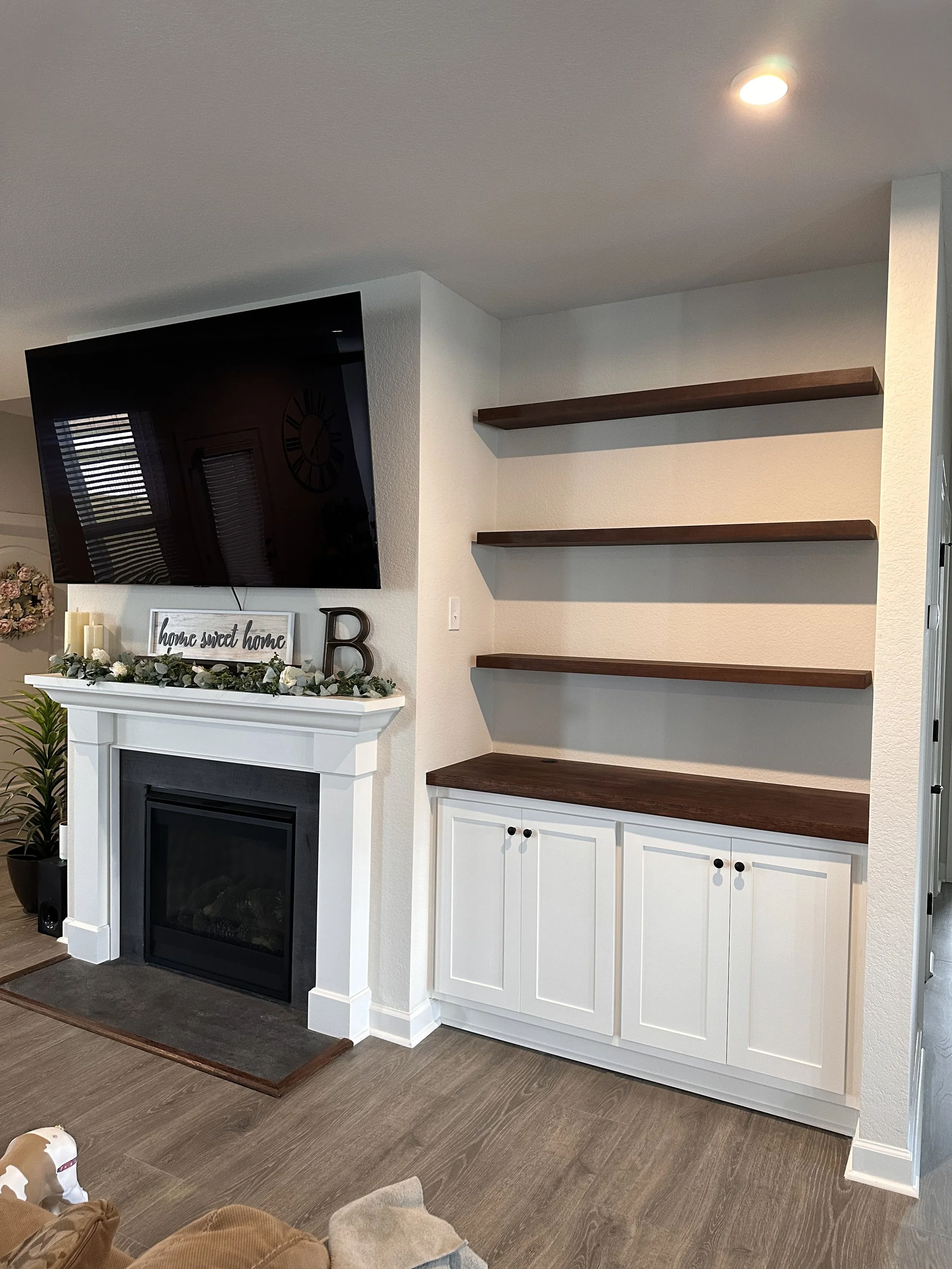 Built in cabinets with floating shelves 