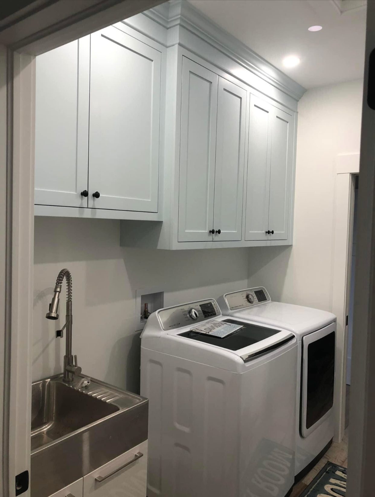 Other side of Blue Laundry room w/ sink hookup