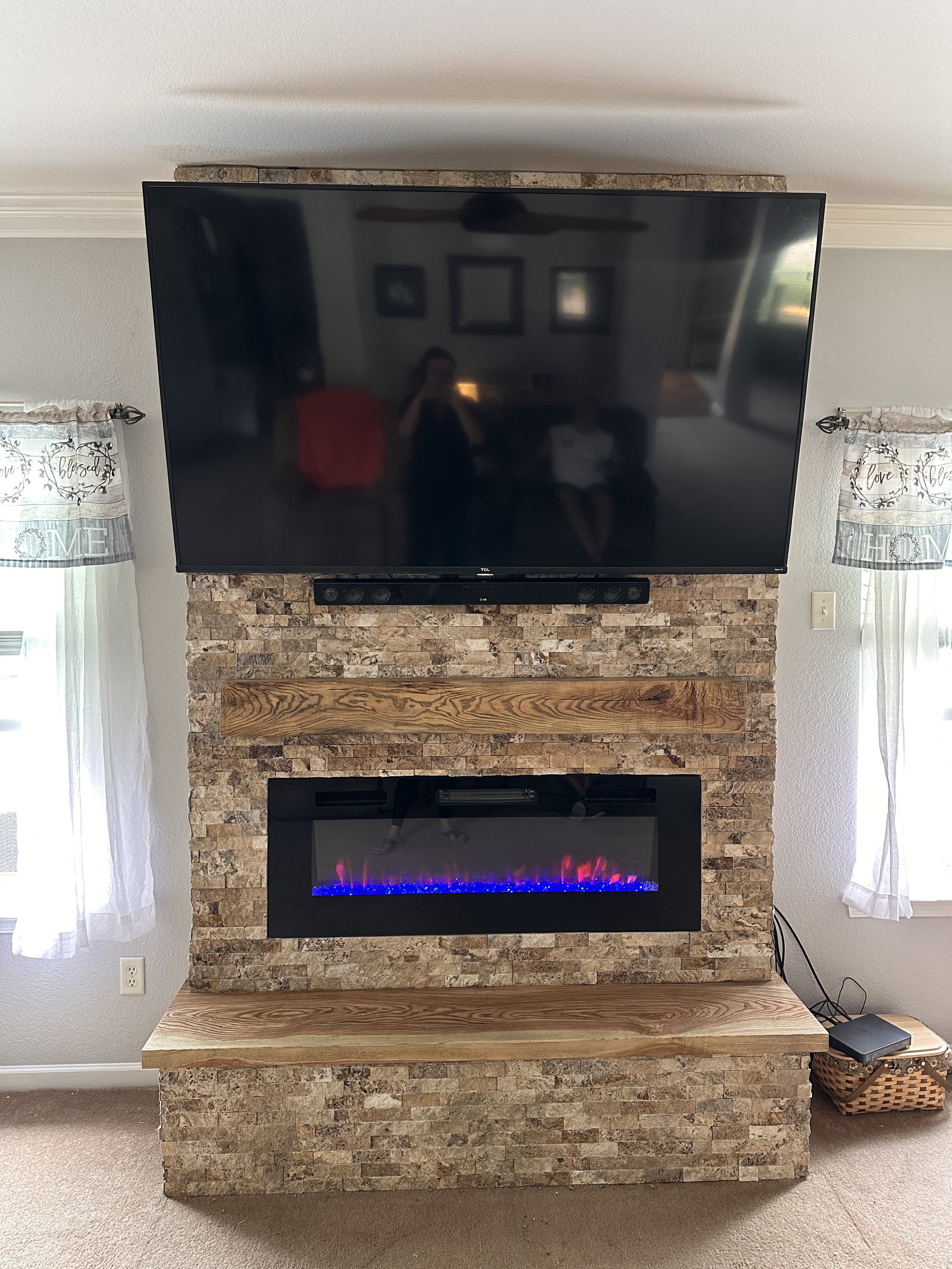 Fireplace with reclaimed ash lumber