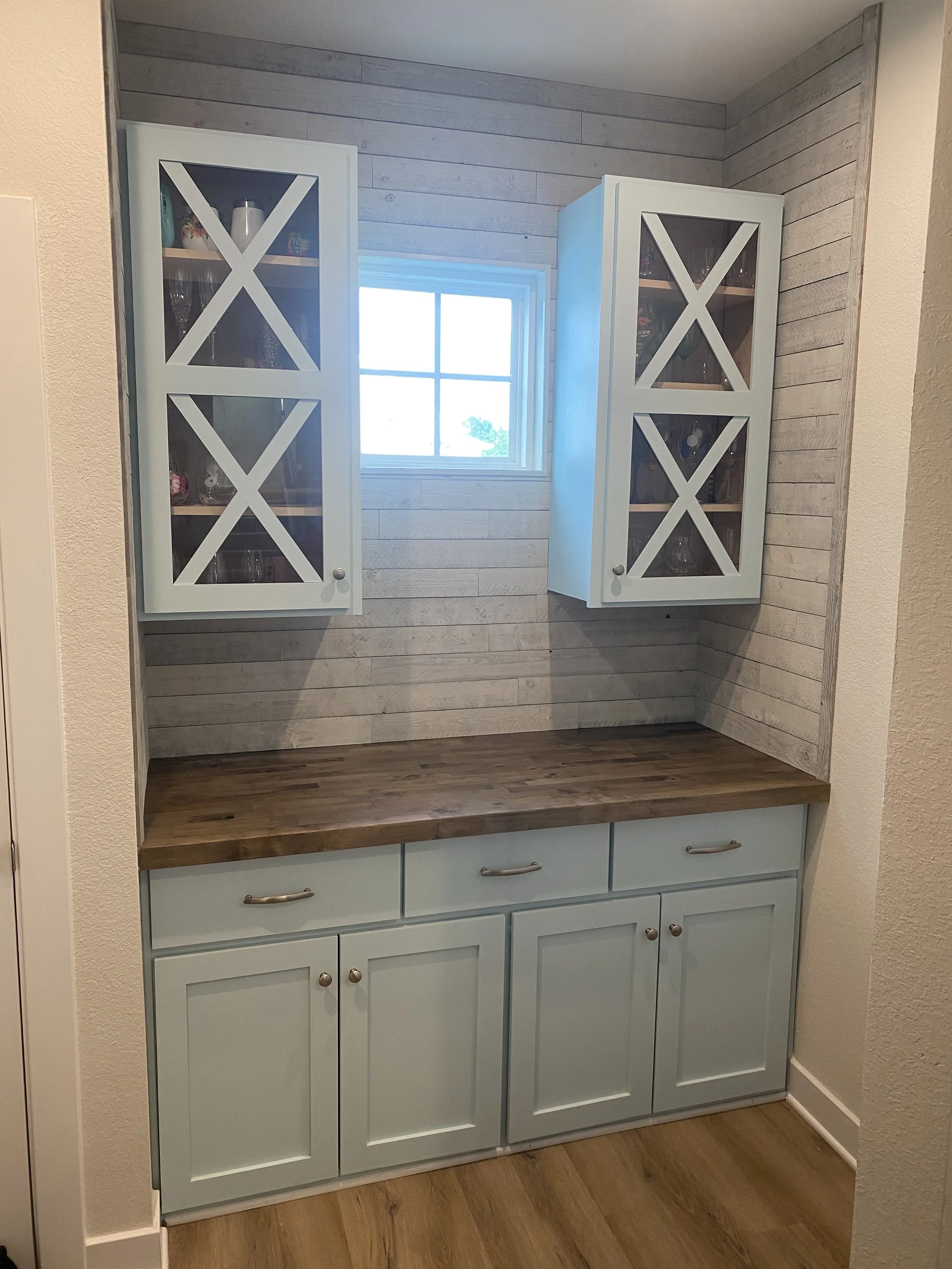 Blue mudroom with glass doors & reclaimed shiplap