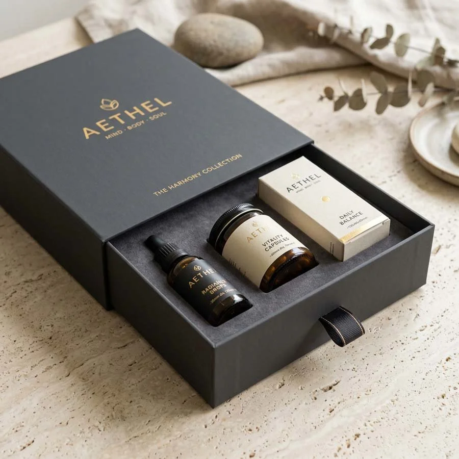 Luxury supplement packaging rigid drawer box with pull tab and card fitment holding supplement bottles and cartons
