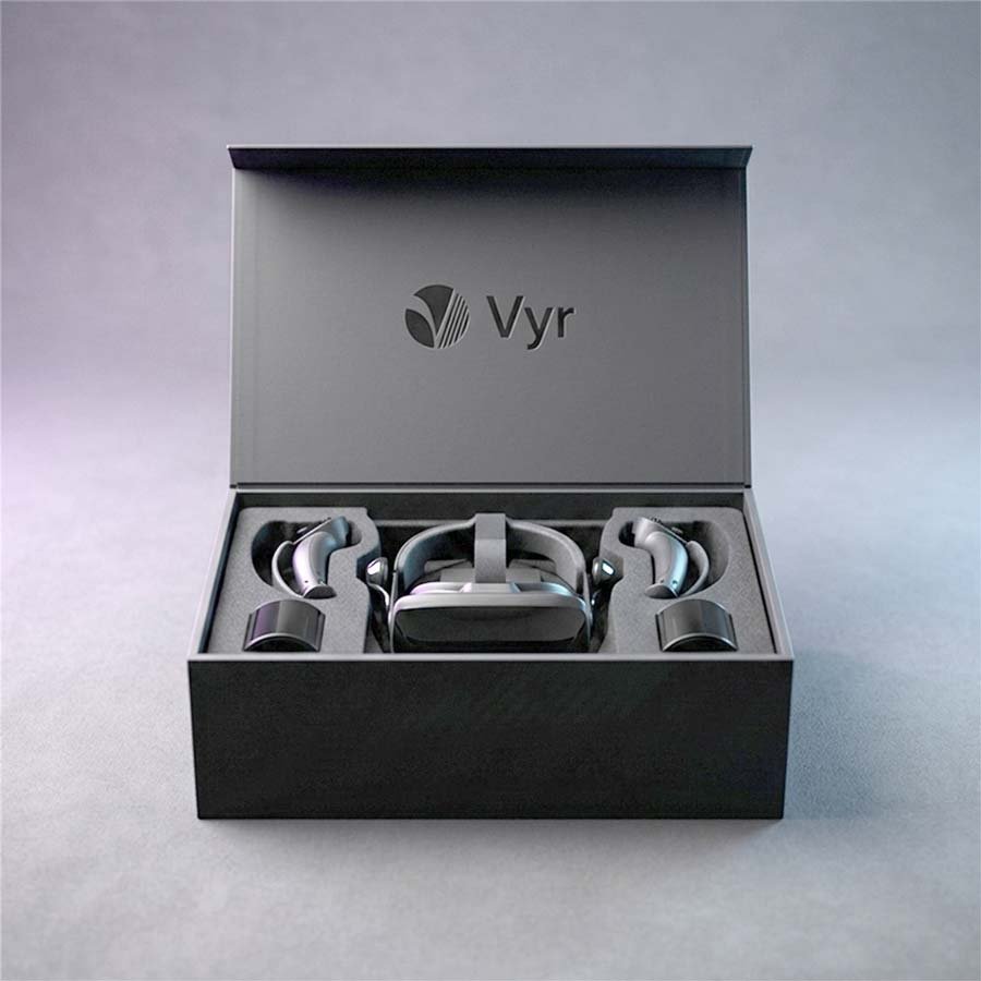 Luxury electronics packaging magnetic rigid box with foam fitment holding VR headset and accessories for a secure premium unboxing experience