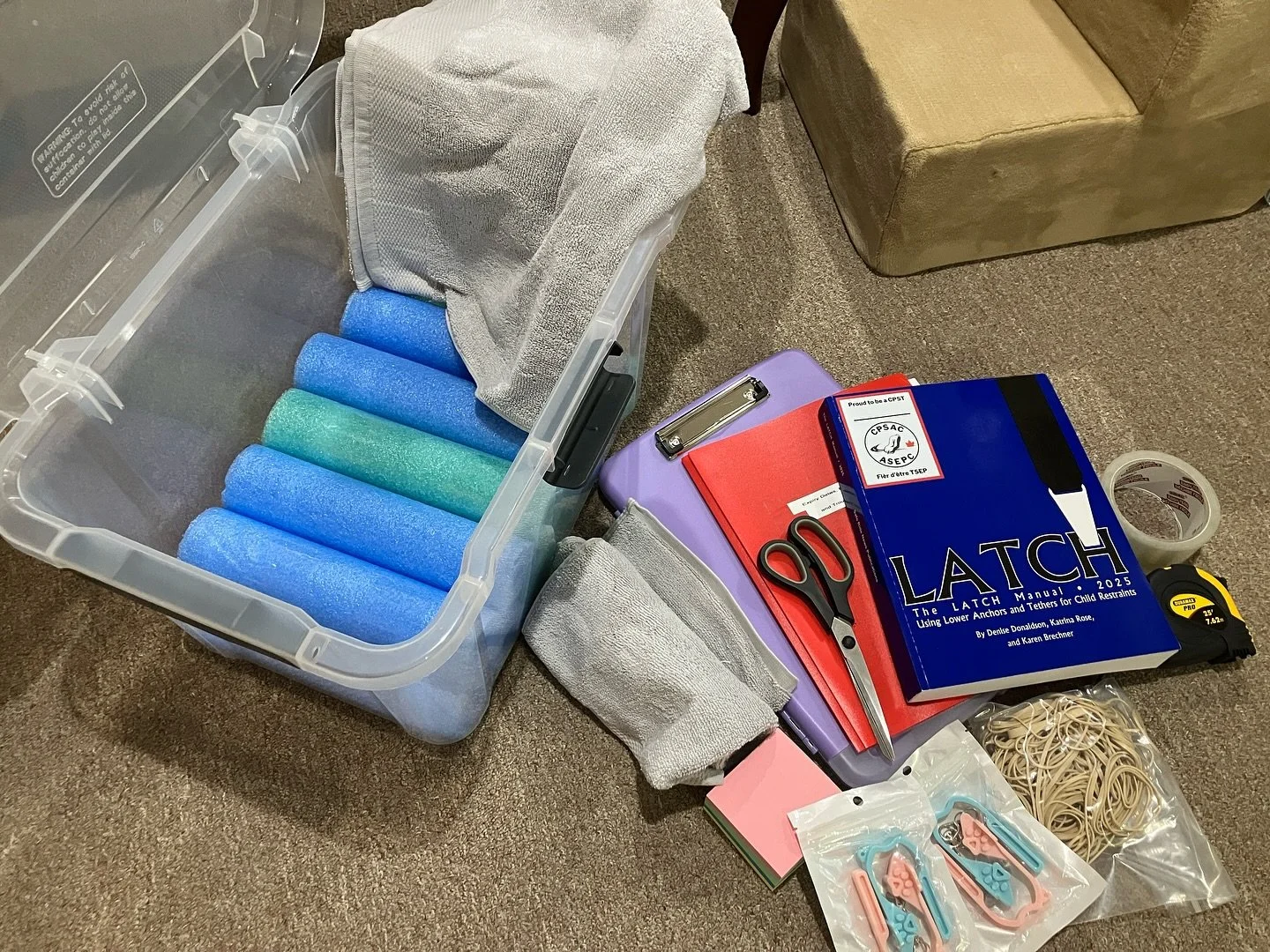 Here is my car seat tech kit. I have this with me anytime I do a seat check. I have a clickboard to put the seat check form on, LATCH manual to refer to when using anchors to install seats, a folder of resources such as laws by province, recalls and 