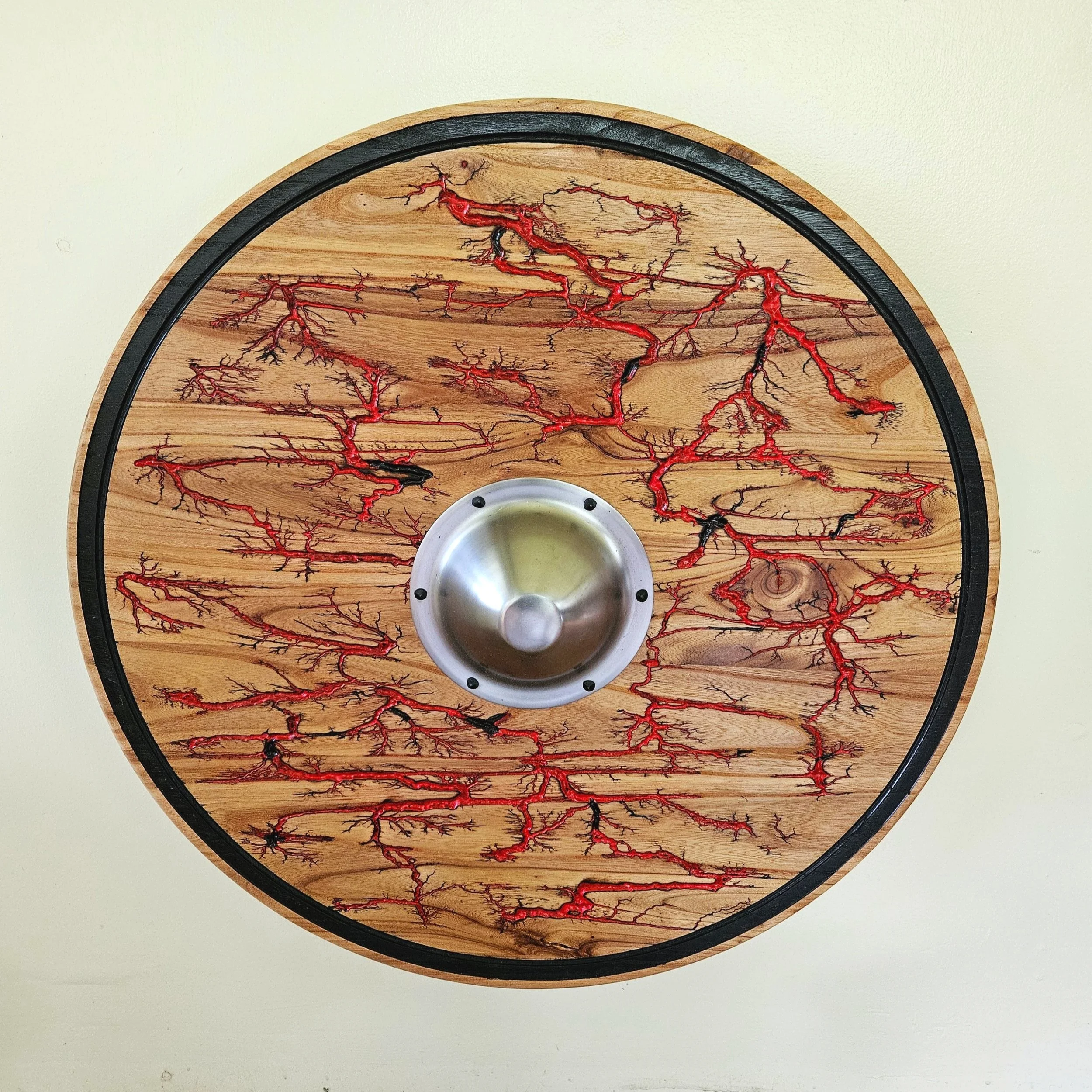 Elm shield wih red lightning