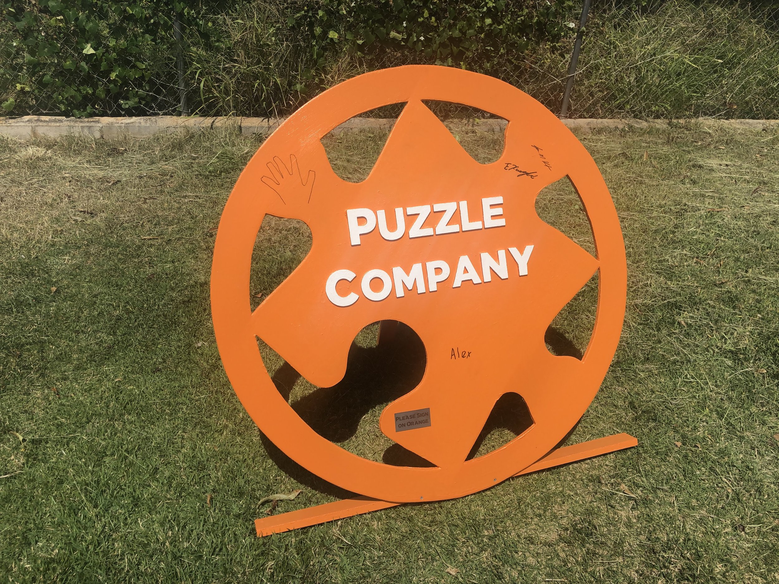 Puzzle Logo Sign (1).JPG