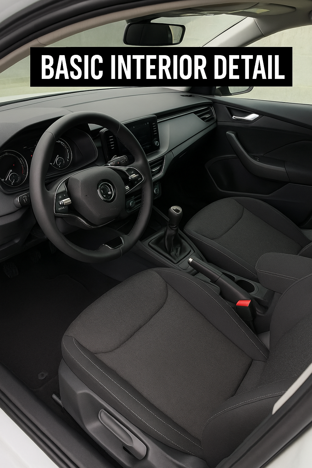 Interior of a car showing the driver's seat, steering wheel, dashboard, gear shift, and passenger seat with the words "Basic Interior Detail" overlaid.