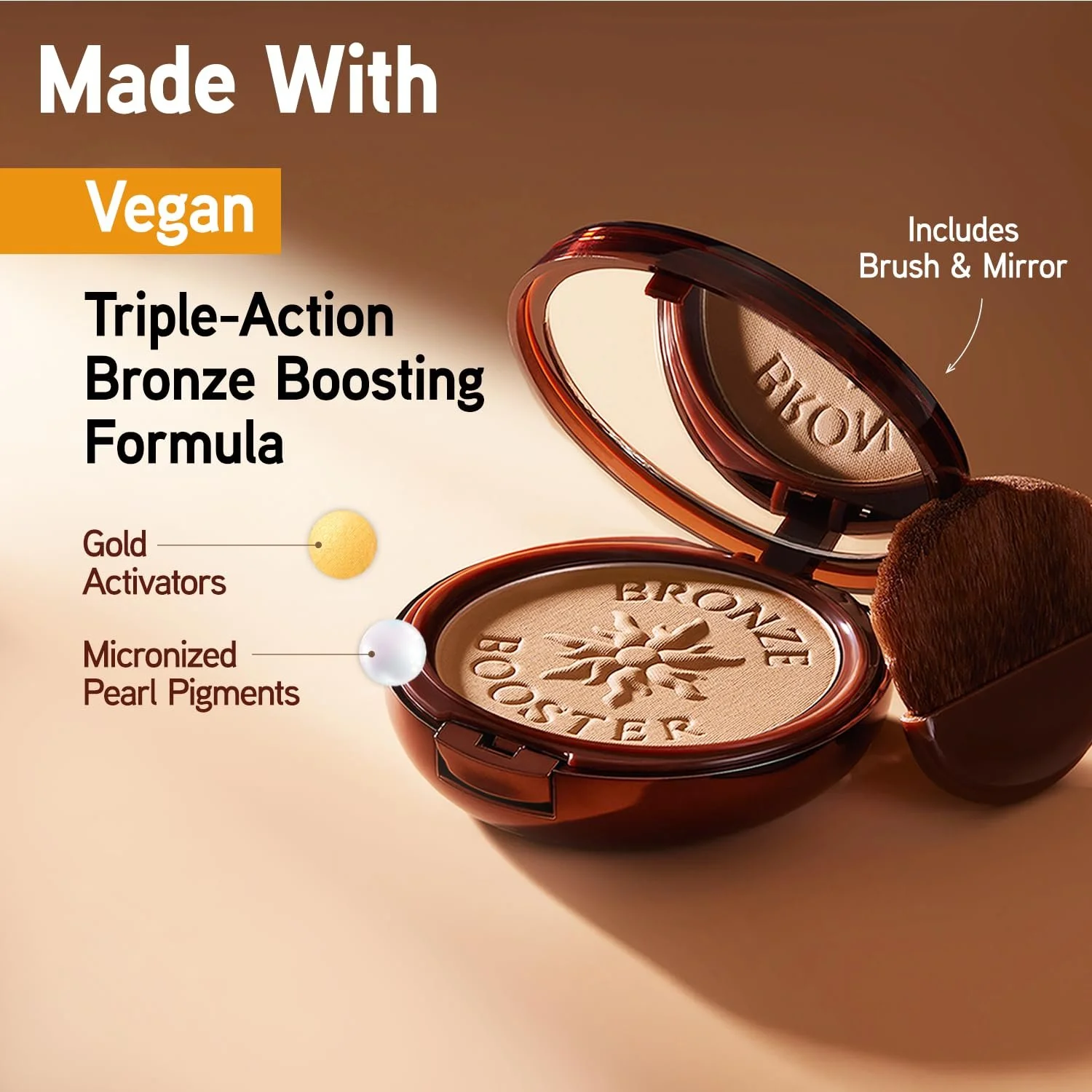 Open bronzer compact with Brush included, showing bronzer embossed with a flower design. Text highlights that the product is made with vegan, triple-action bronze boosting formula, including gold activators and micronized pearl pigments. Product phot