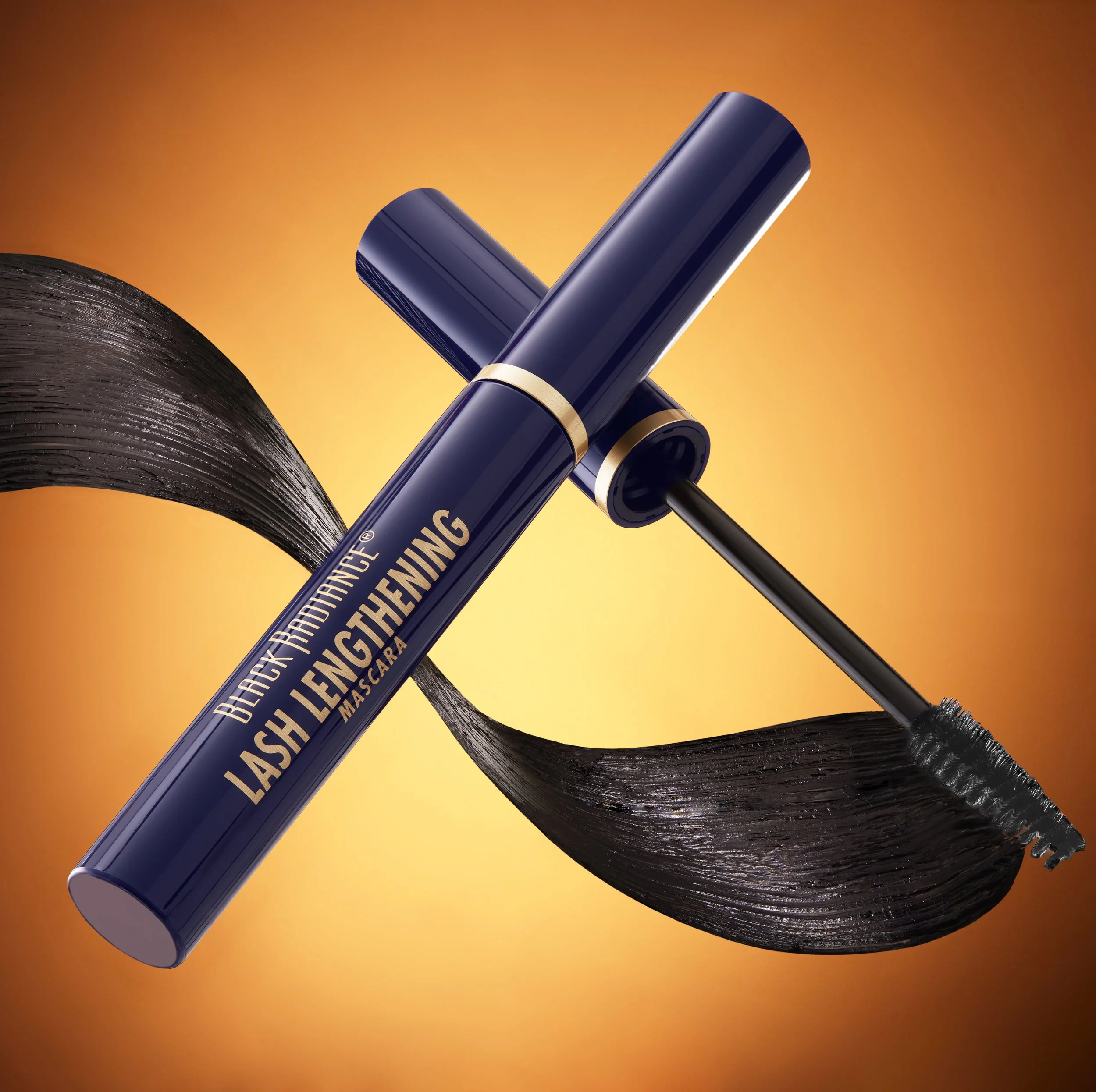 A tube of Black Radiance Lash Lengthening mascara with the wand applicator. Product photography Los Angeles.