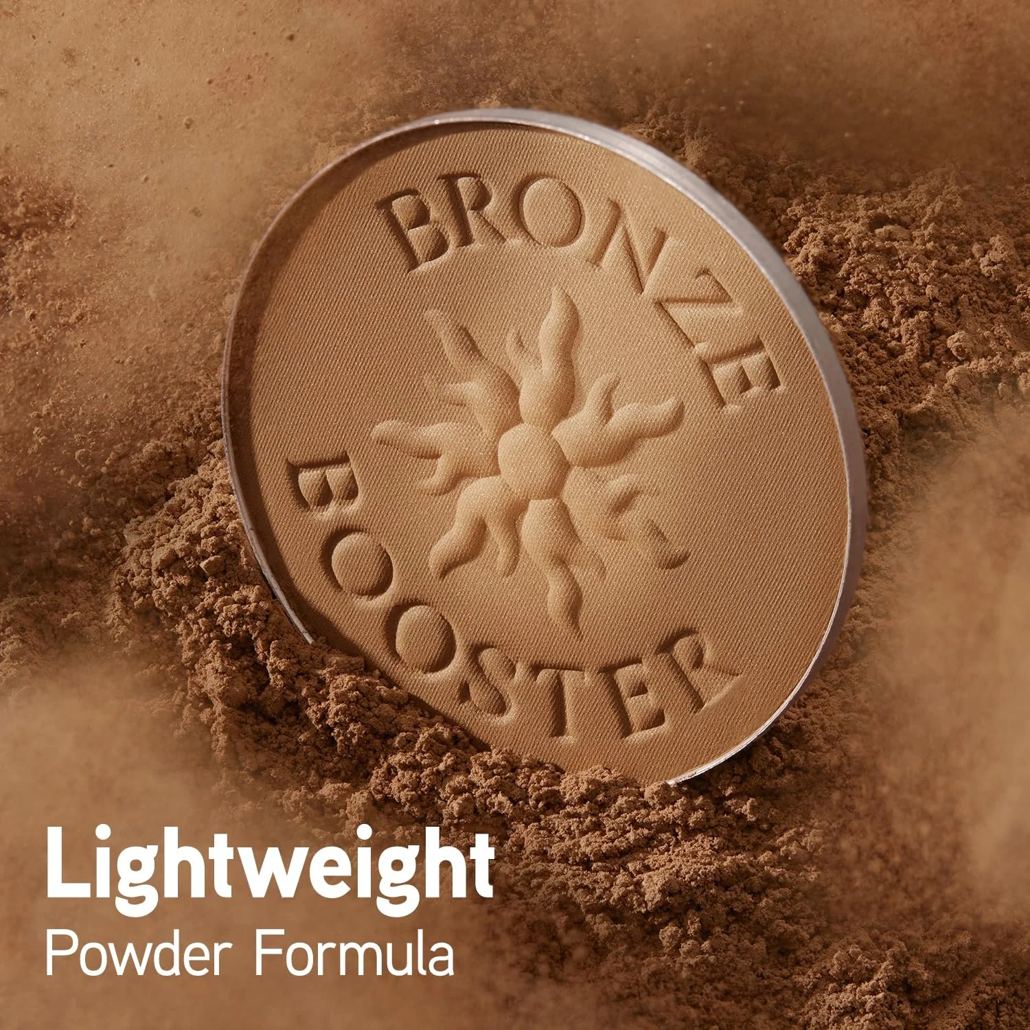Close-up of a pressed powder makeup compact from the brand 'Eronze' standing on a bed of brown powder. The compact features a sunburst design with the brand name engraved on the surface. The text 'Lightweight Powder Formula' appears in white at the b