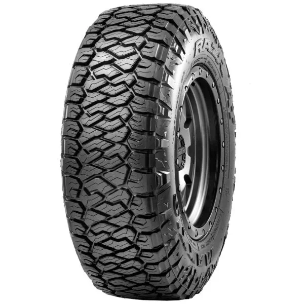 A close-up of an off-road tire with rugged tread pattern.