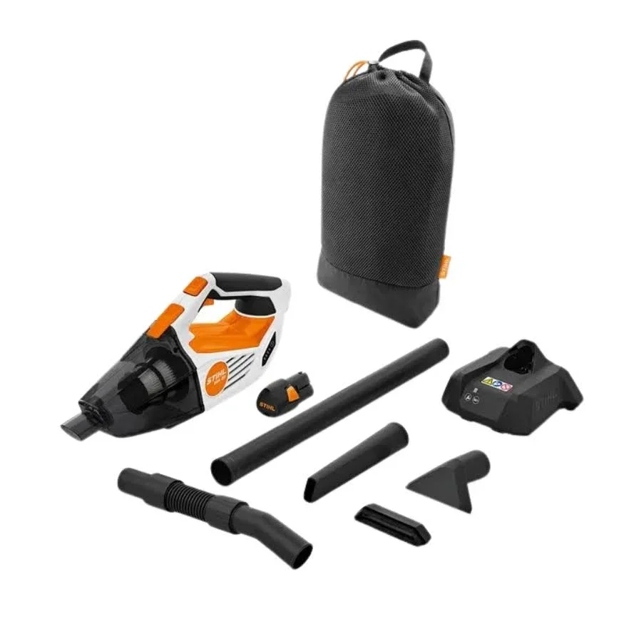 Stihl handheld leaf blower with various accessories and a carrying case.