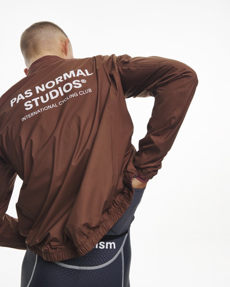 PAS NORMAL STUDIOS Mechanism Pertex Rain Jacket Dark Brown Men 