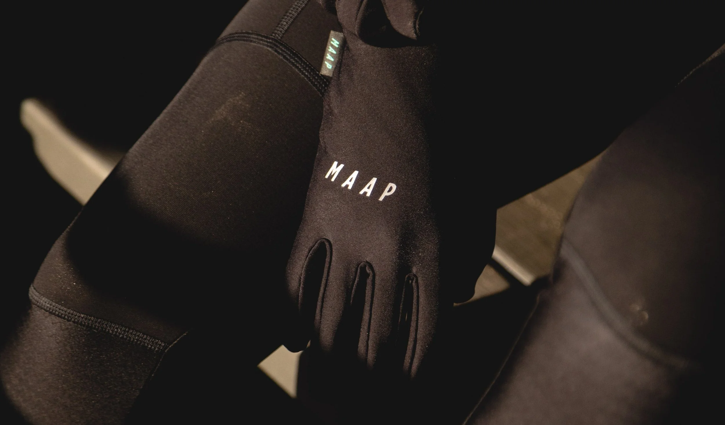 Glove_BaseGlove_BLK_MWG010__maap-cycling-apparel__PDP_LIFESTYLE_01_DESKTOP.jpg