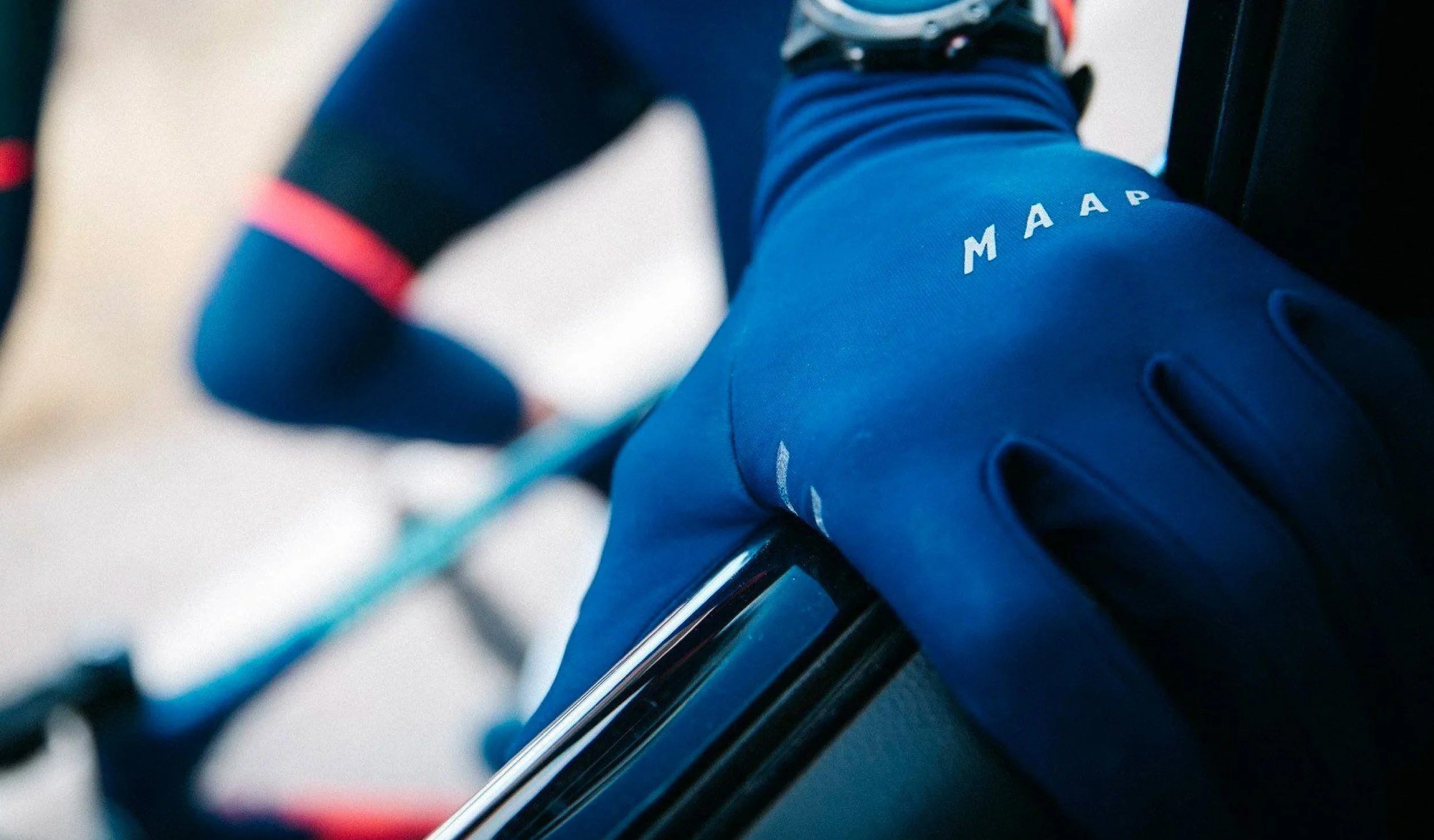 Glove_BaseGlove_NVY_MWG009__maap-cycling-apparel__PDP_LIFESTYLE_01_DESKTOP.jpg